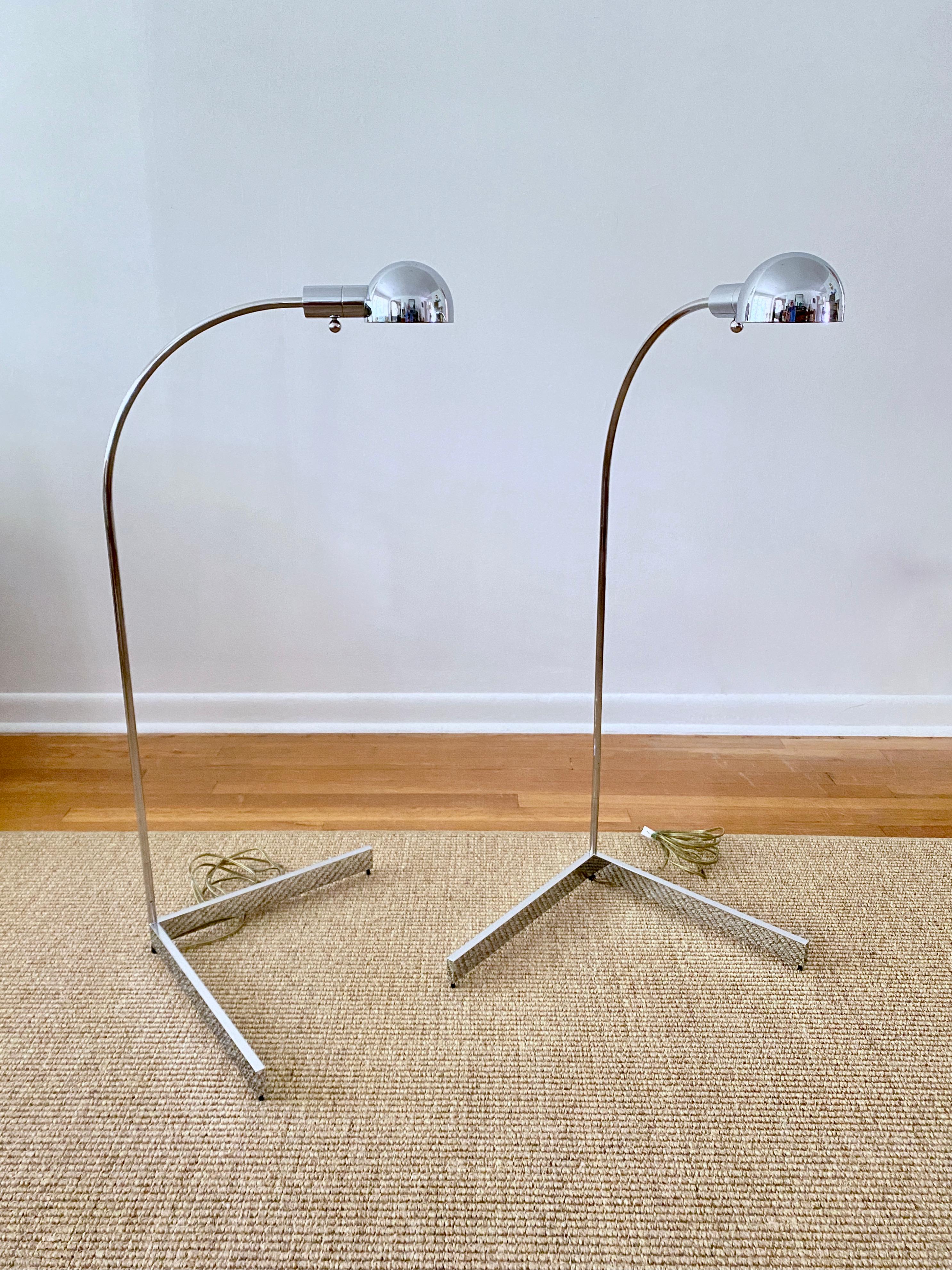 A vintage pair of Cedric Hartman floor lamps designed in 1966 and manufactured by The Afternoon Light Company (Cedric Hartman), Omaha, Nebraska. This model, 1H, was first introduced in 1966 and has been discontinued. The pair consists of a chrome