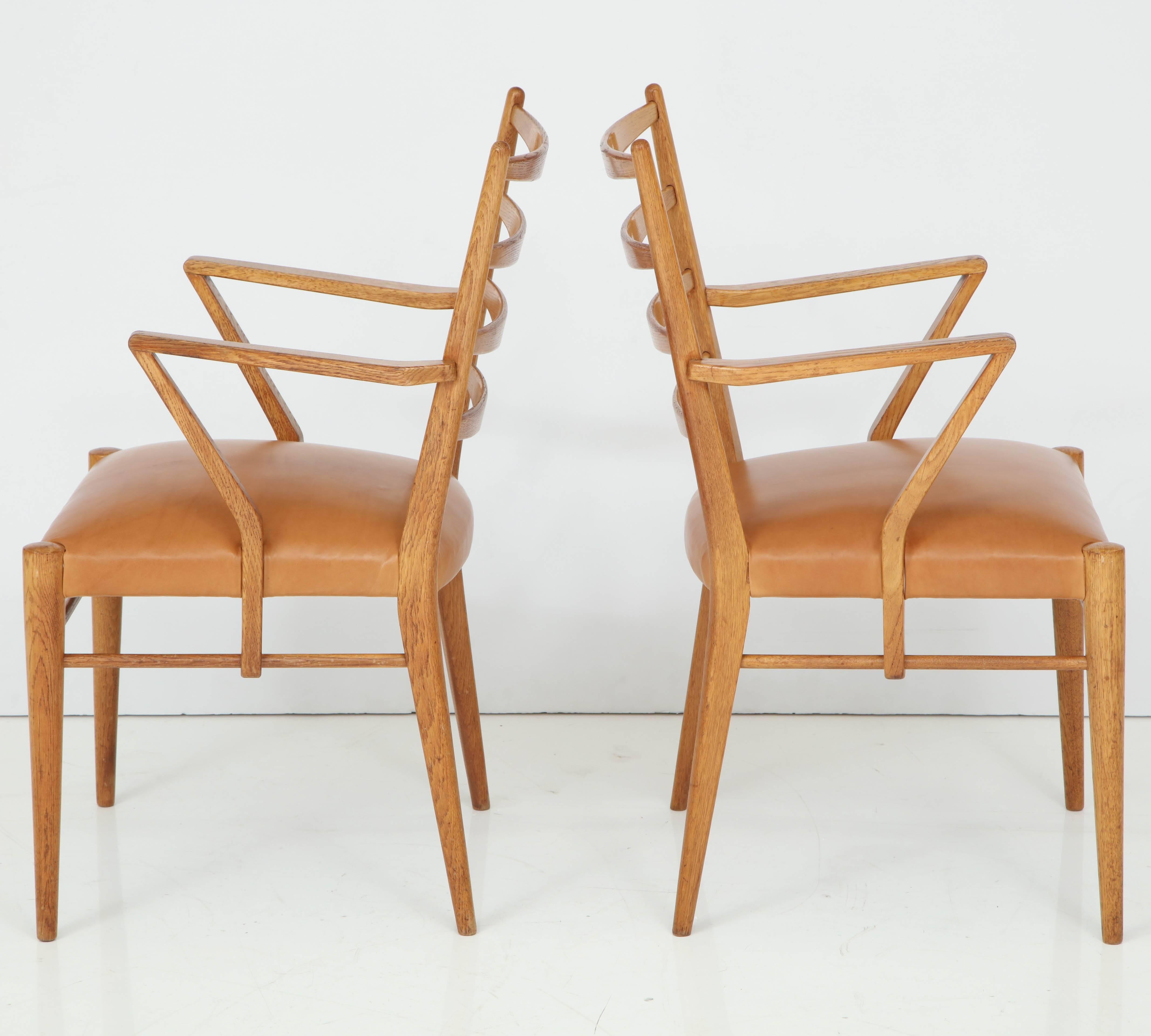 Dutch Pair of Cees Braakman Oak and Leather Open Armchairs, circa 1950s
