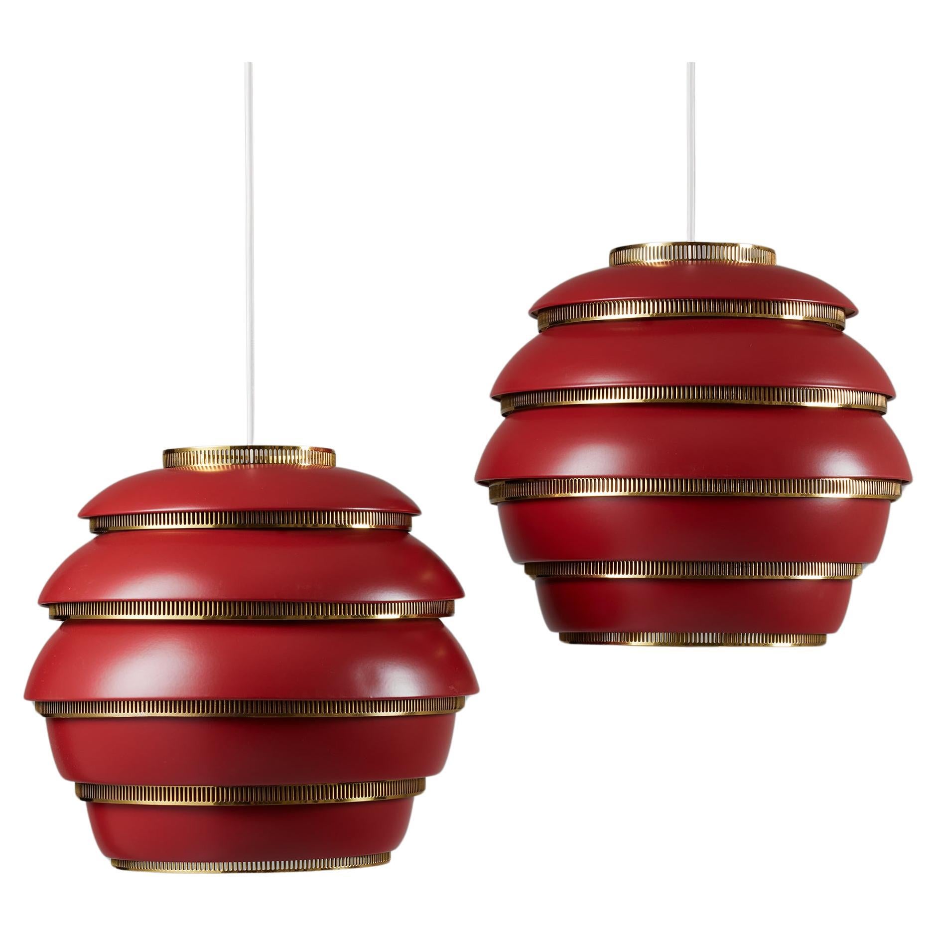 Pair of ceiling lamps 'Beehive' model A332 designed by Alvar Aalto, 1952, Red