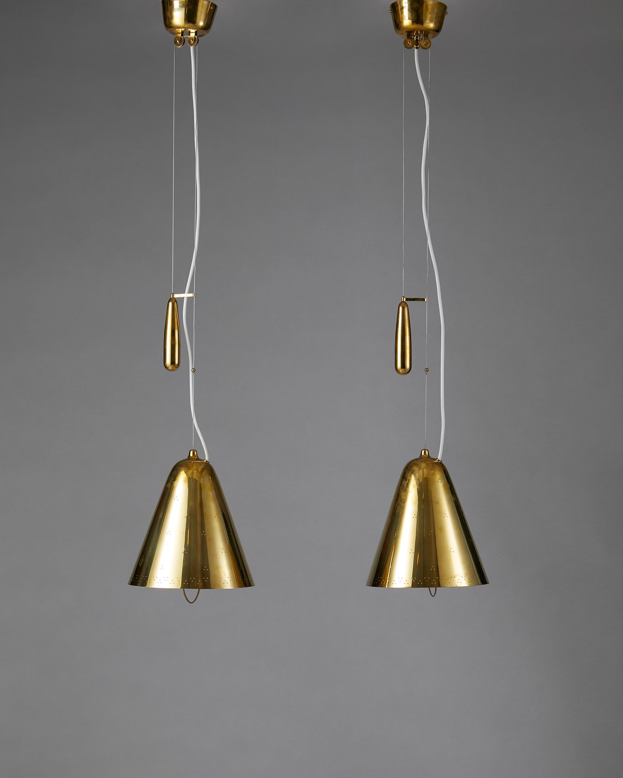 Brass.

Drop height adjustable.