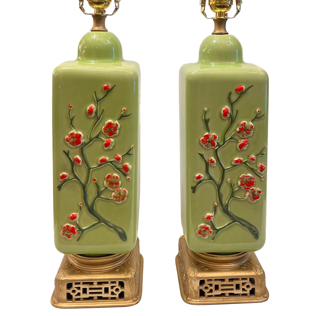 Pair of circa 1950's French celadon lamps with floral decoration.

Measurements:
Height of body: 15.75