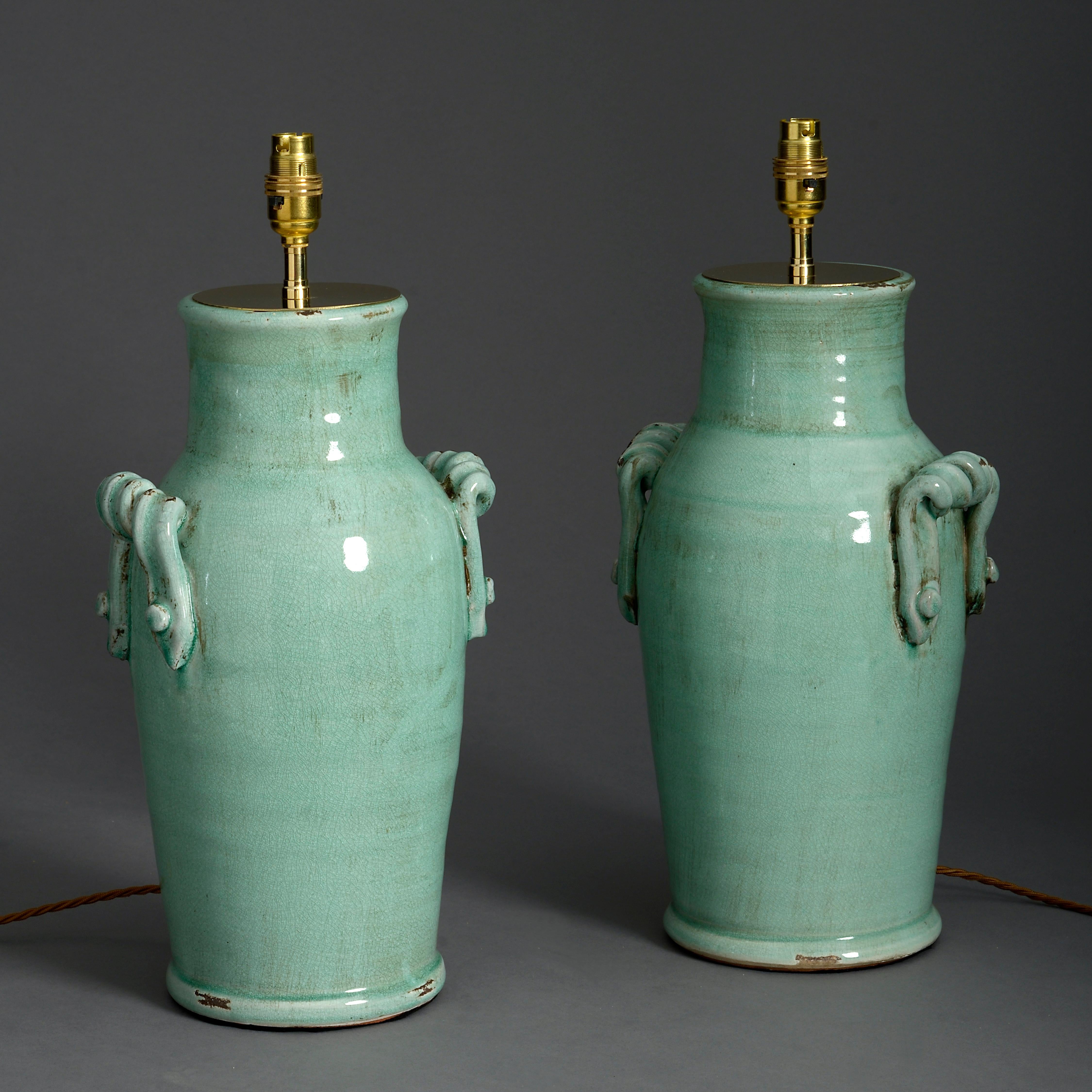 A pair of celadon crackle glazed vases now mounted as table lamps.

Dimensions refer to height of vases only.

Shades available to buy separately

