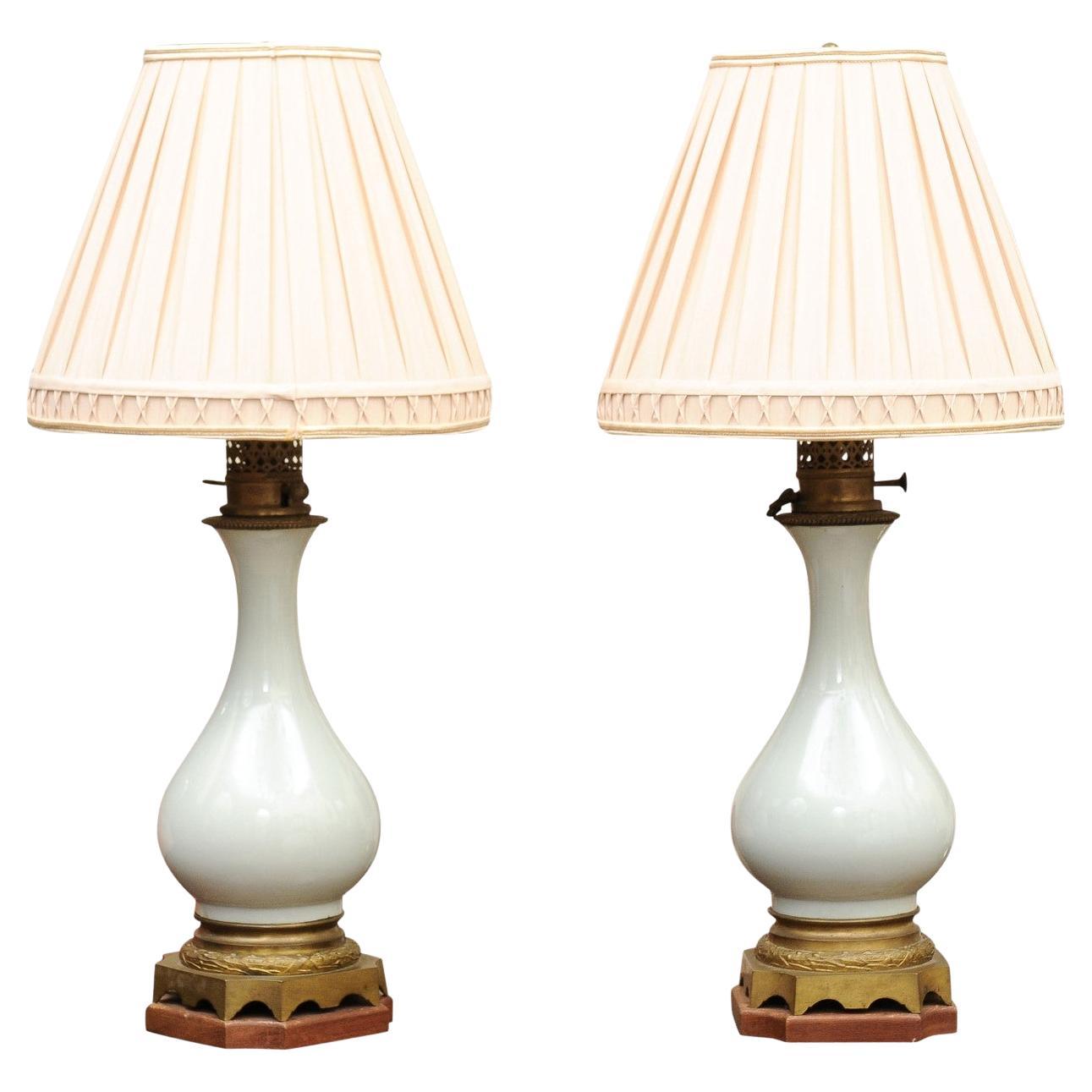 Pair of Celadon Porcelain Vases Mounted on Bronze Bases, Wired as lamps