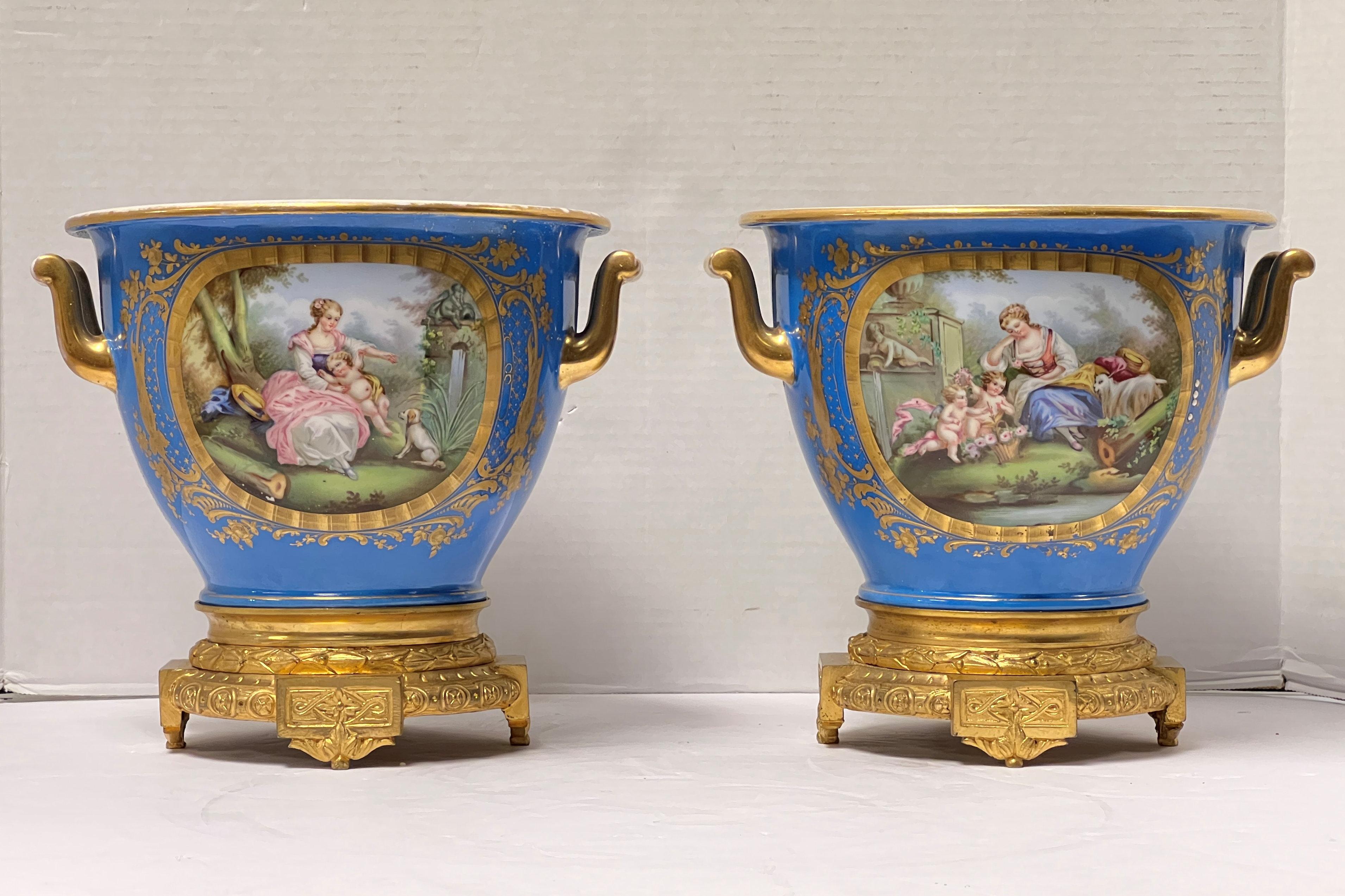 Pair of very fine quality French 19 century Gilt Bronze mounted Celest blue Serves porcelain cachepots.