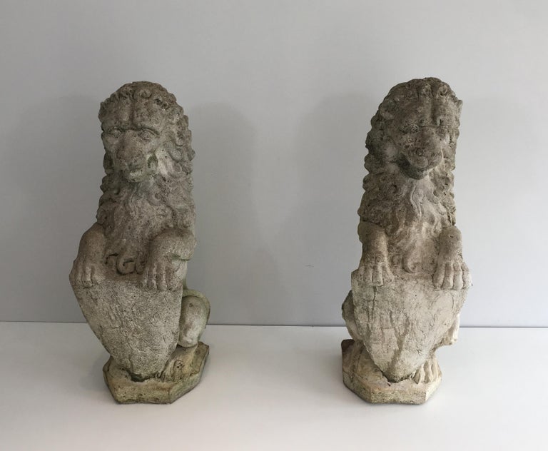 Pair of Cement Lions Standing with a Shield, French, circa 1950 at 1stDibs