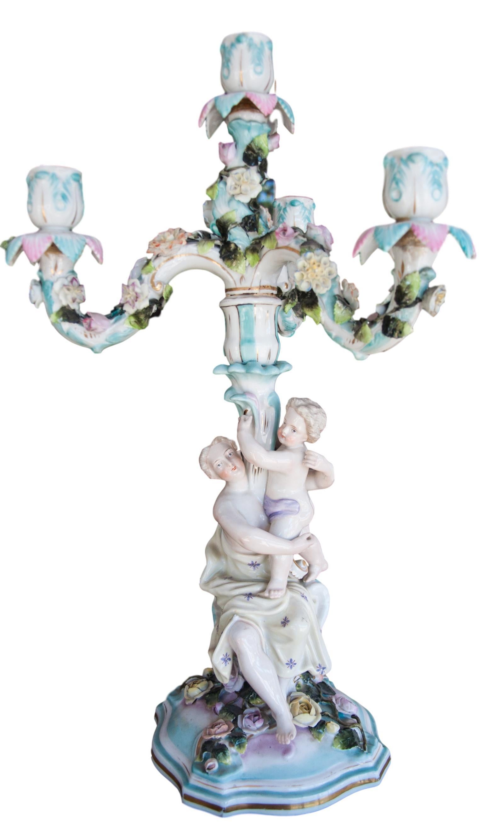Pair of century Dresden Porcelain candlesticks, circa mid-19th century by Sitzendorf. Vibrant coloration and marked on the bottom, pictured. In great condition.