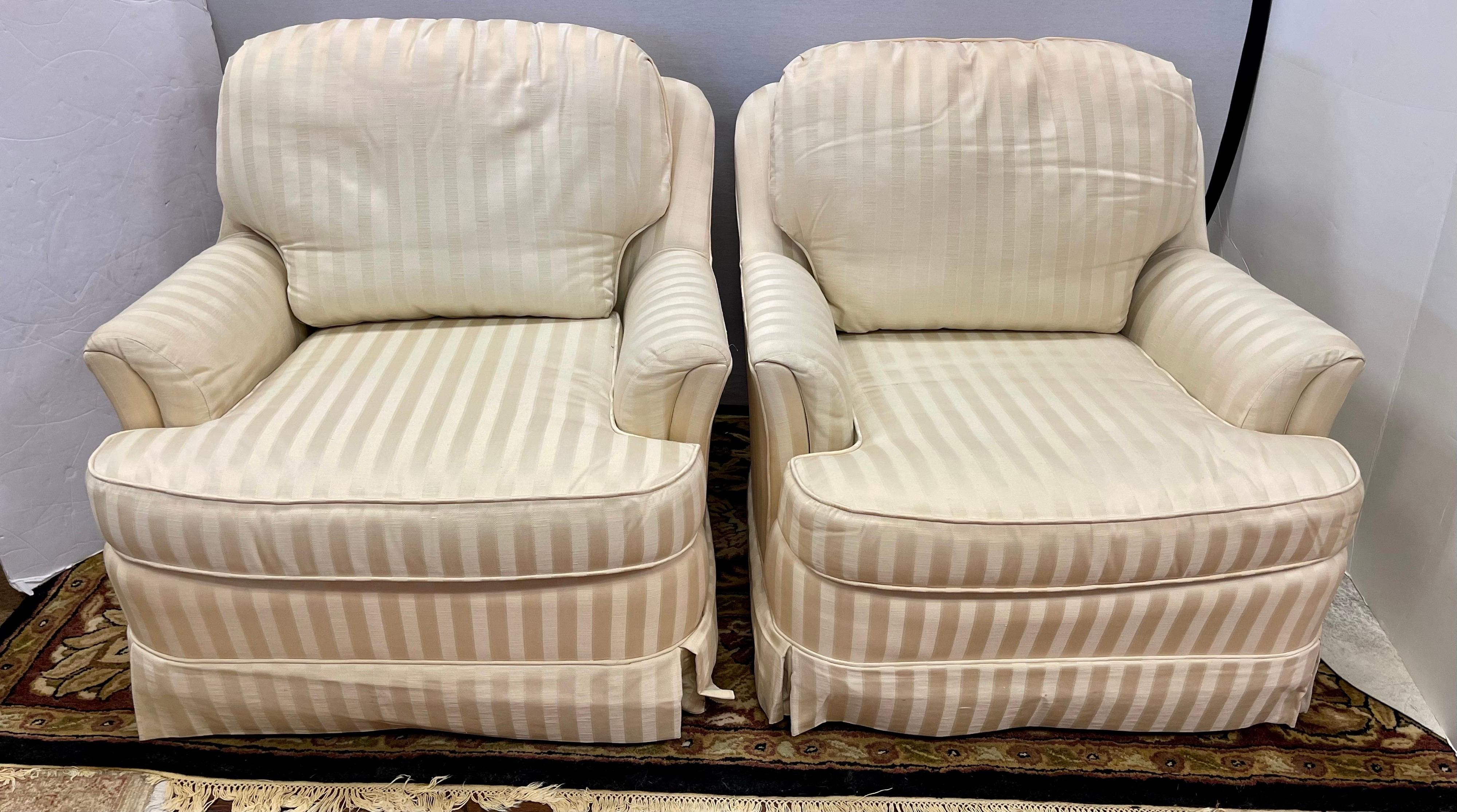 Elegant pair of matching striped club chairs by Century Furniture. Made in the USA. Great scale and better lines. The colors are gold and beige.