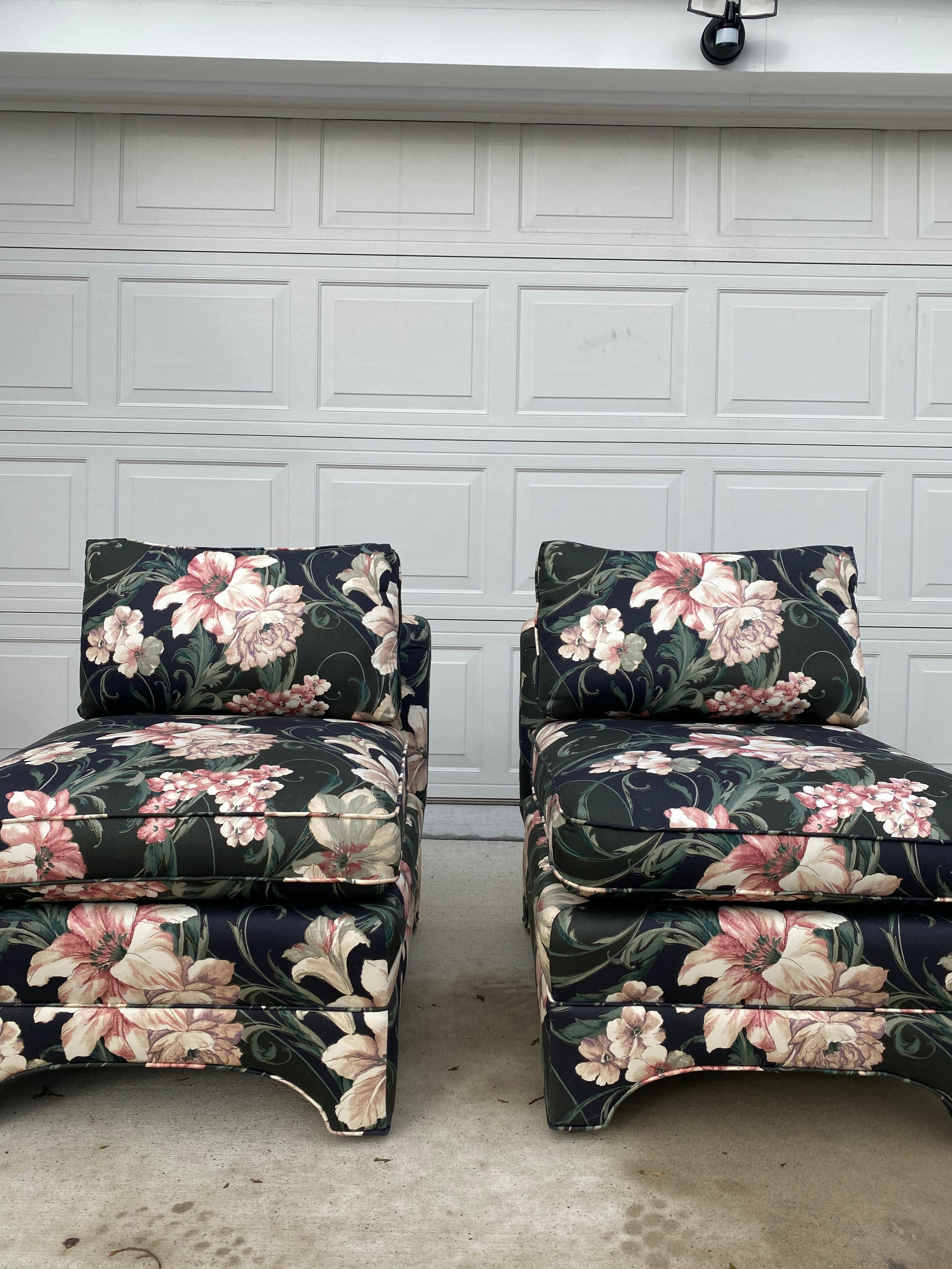 Pair of vintage Century lounge chairs in floral fabric. No physical tears but does need cleaning at it is from a pet-friendly home. It was reupholstered with its last owner. We recommend reupholstery to bring it back to its original beauty. Let us