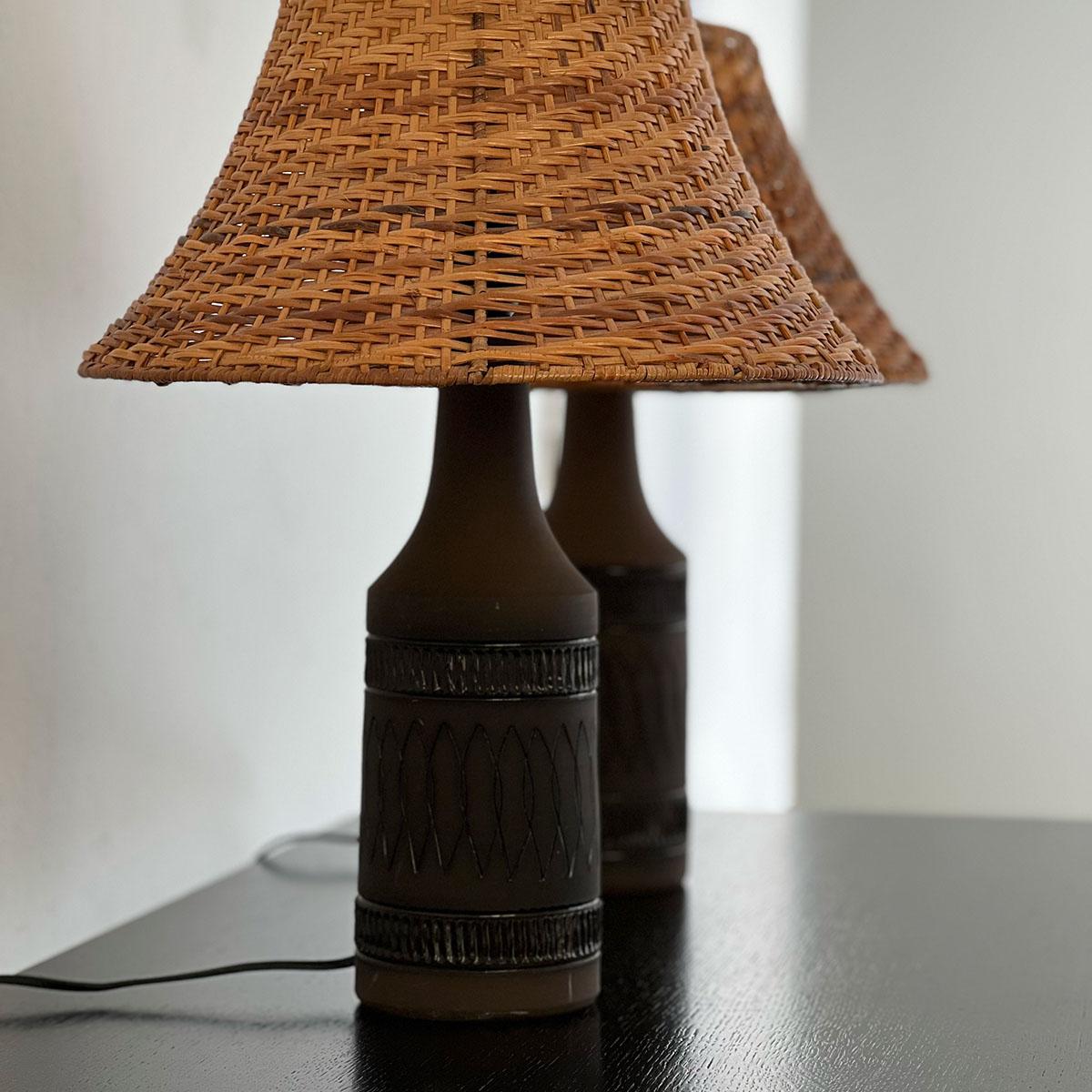 Pair of ceramic table lamps designed and manufactured by Nila in Sweden, 1960s.

An outstanding pair of table lamps designed and manufactured by Nila in the 1960s. Each of these table lamps features a dark brown-colored ceramic body with a