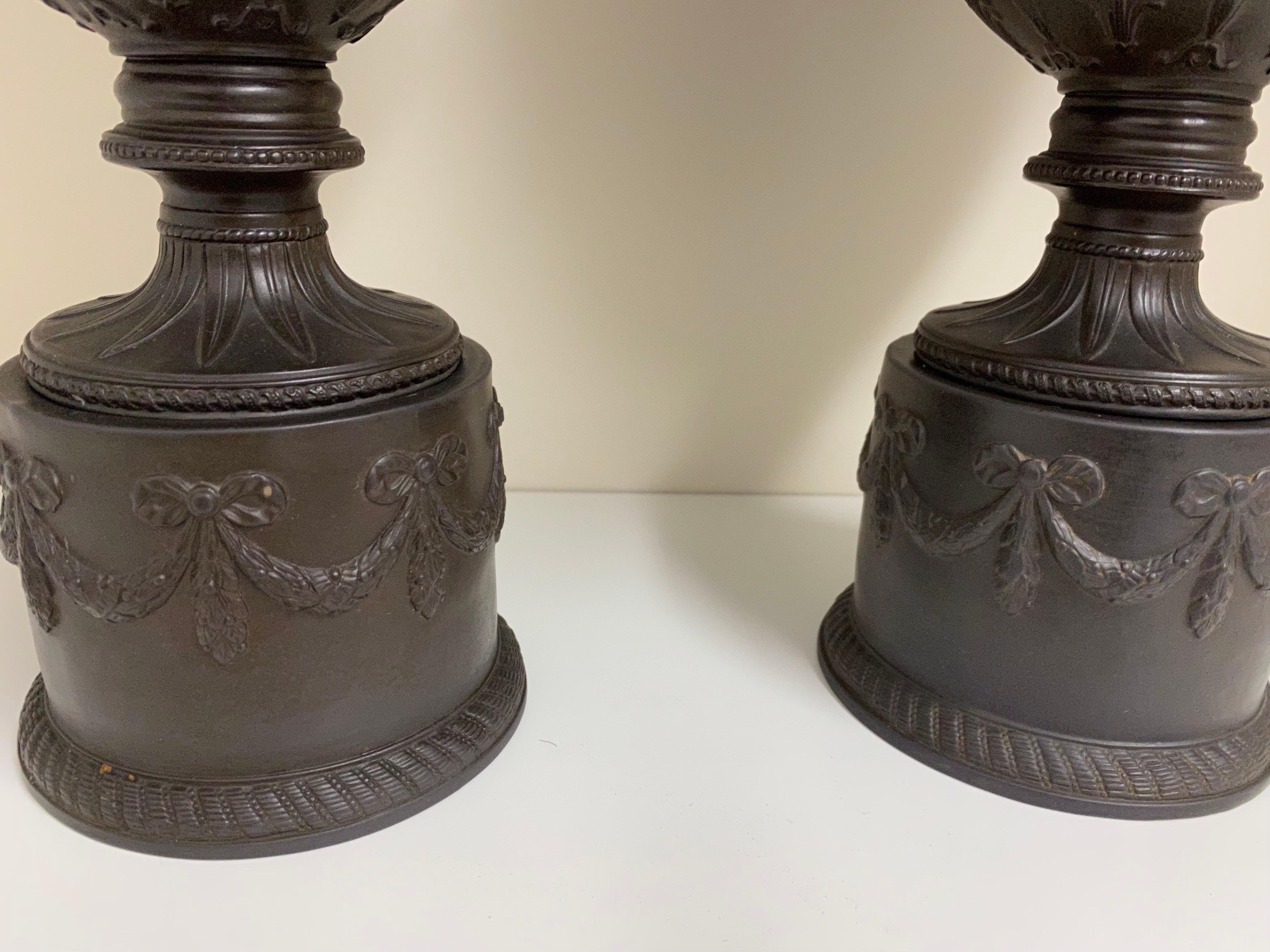 Neoclassical Pair of Ceramic Basalt Relief Urns Attributed to Wedgwood For Sale