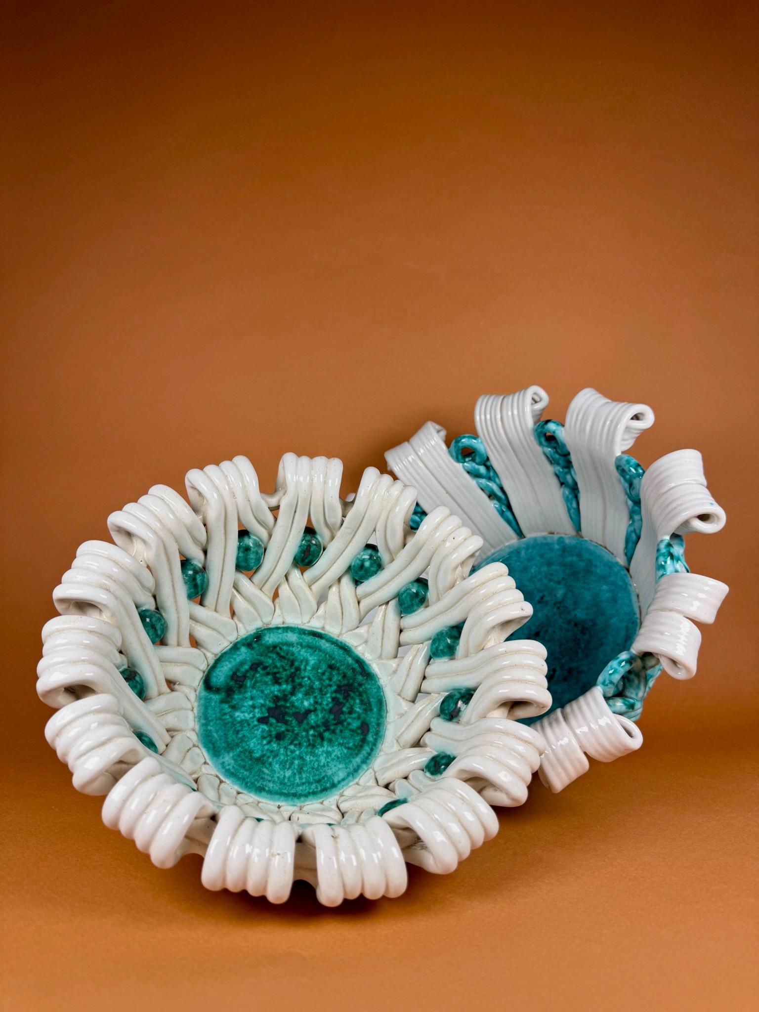Origin
Sainte-Radegonde, France, circa 1940

Materials
Glazed ceramic

Condition
Very good vintage condition, consistent with age

A charming pair of ceramic baskets from Sainte-Radegonde, France, circa 1940, exemplifying the rustic artistry for