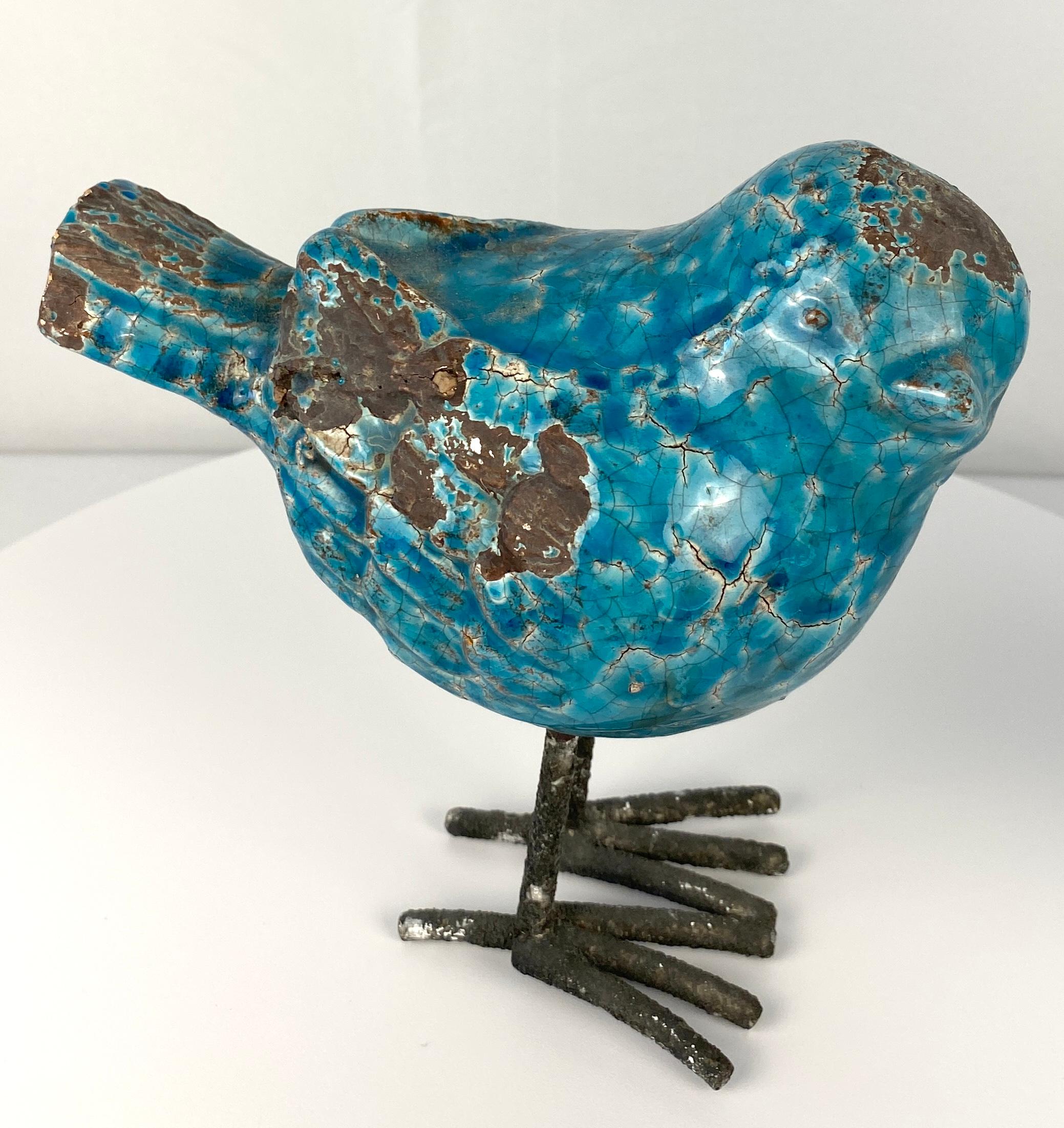 A charming pair of Italian ceramic birds. 

Hand-crafted and hand-painted in a stunning turquoise then glazed, these birds would make a fantastic addition to bookcases, wall shelves, or curio cabinets. 

Will enhance any beach house, contemporary,