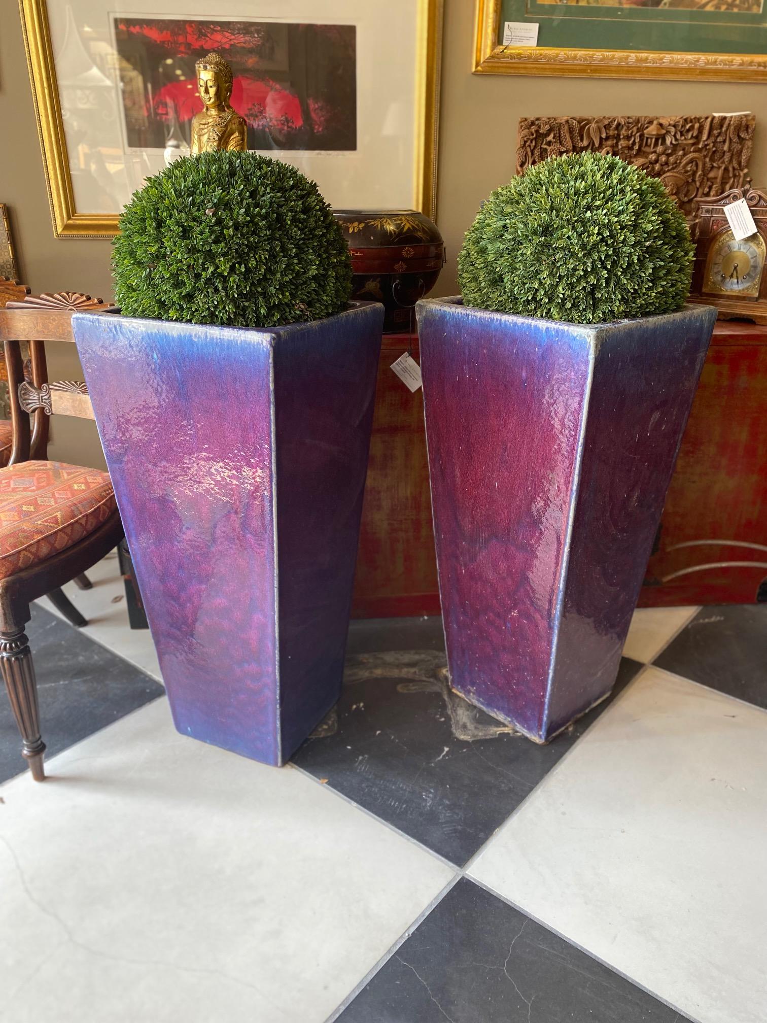 This Pair of lead glazed Blue and Purple/Ombre' TALL PLANTERS where made before 1949. The colors are wonderful because of the lead in the glaze. We will ship the topiary 