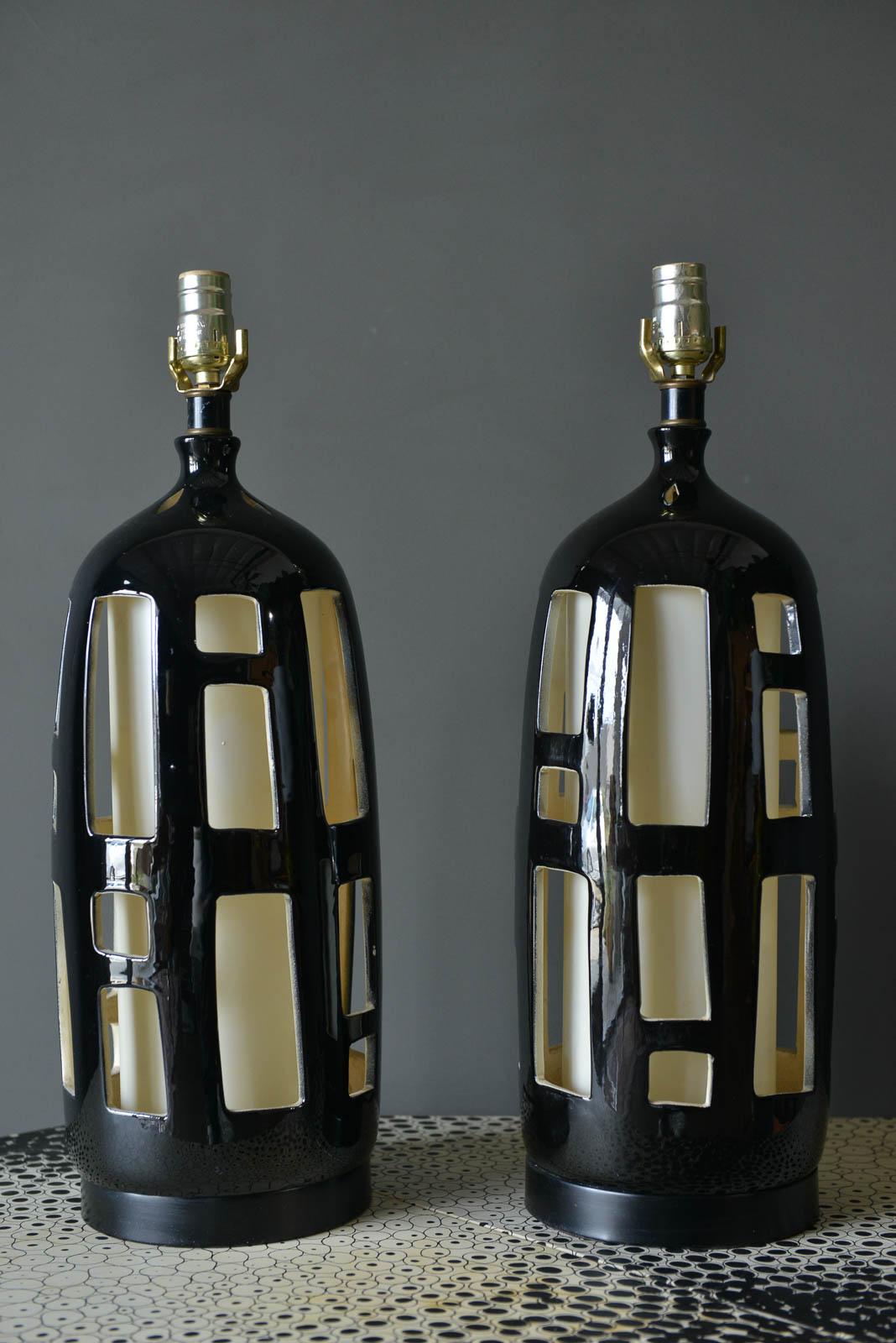 American Pair of Ceramic Cut Out Lamps with Dual Illumination, circa 1970