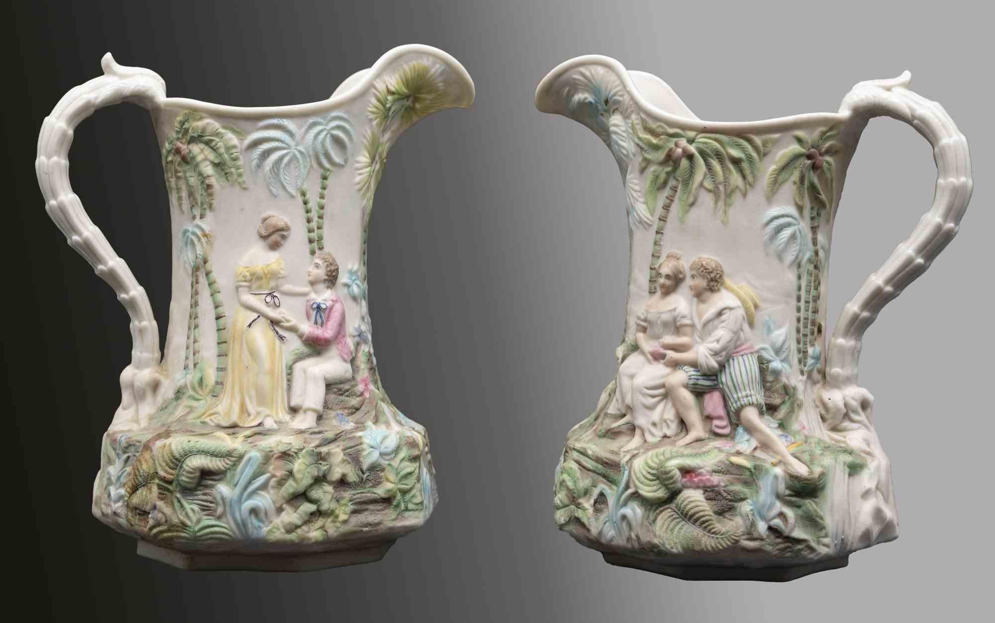 Paire de pichets en céramique est une paire d'objets décoratifs réalisés au début du 20ème siècle.

Fabrication italienne.

En bonnes conditions.