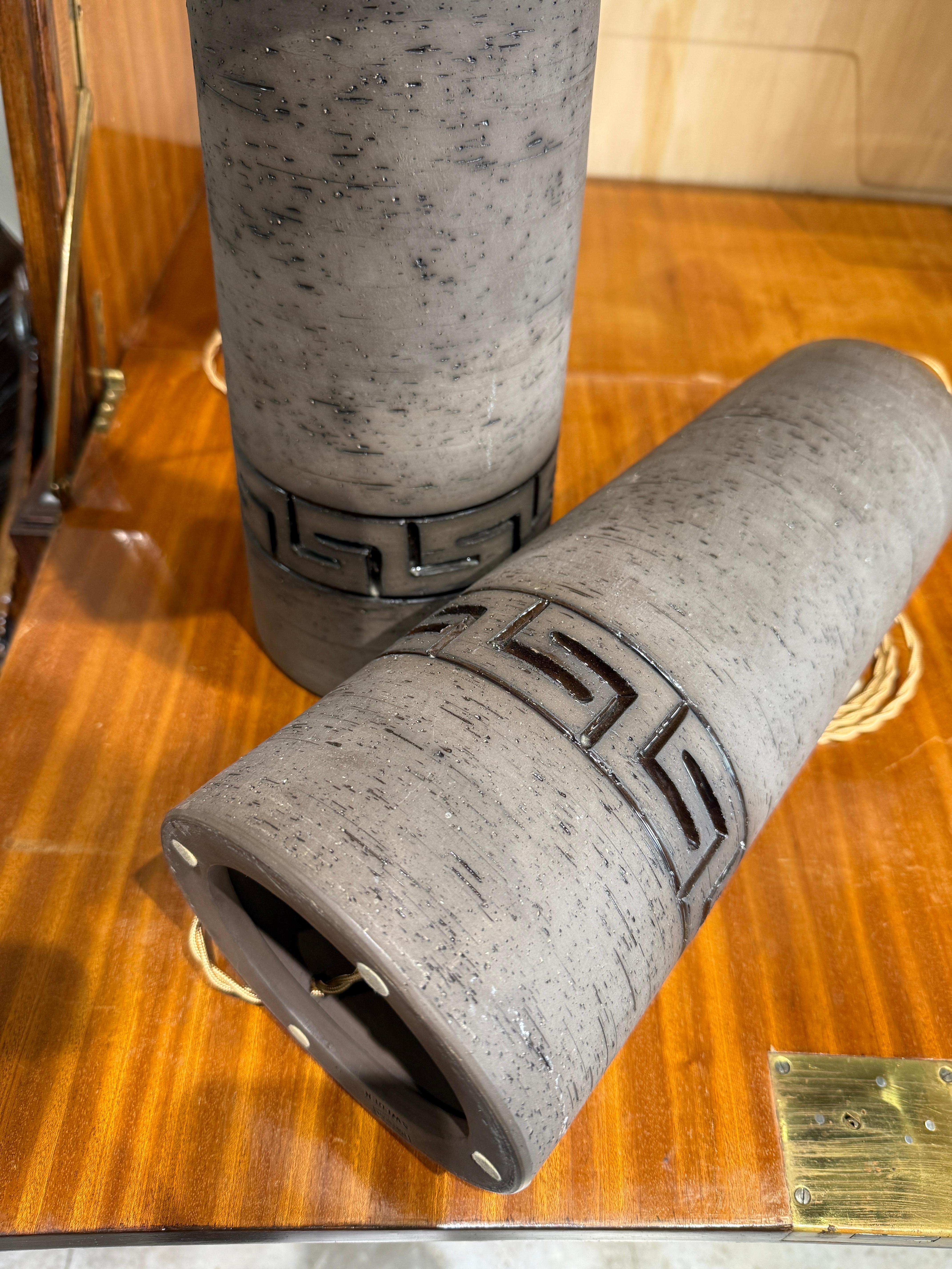 Nice greek details for this pair of earthenware lamps signed Toreboda 
Sweden 1970 
Rewired for EU 

Base of lamp Height 36 cm