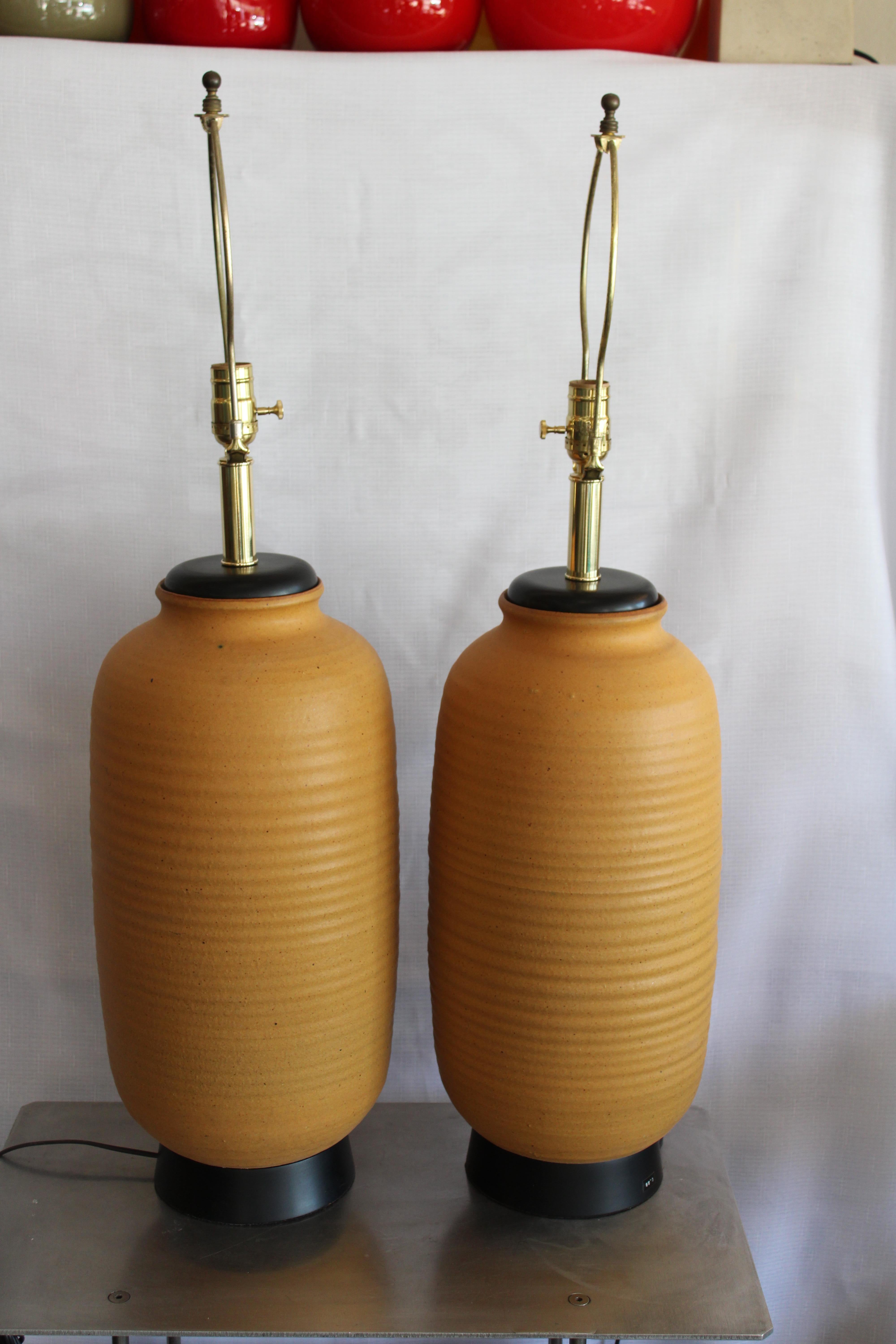 Pair of ceramic lamps by Bob Kinzie. Lamps measure 9.5