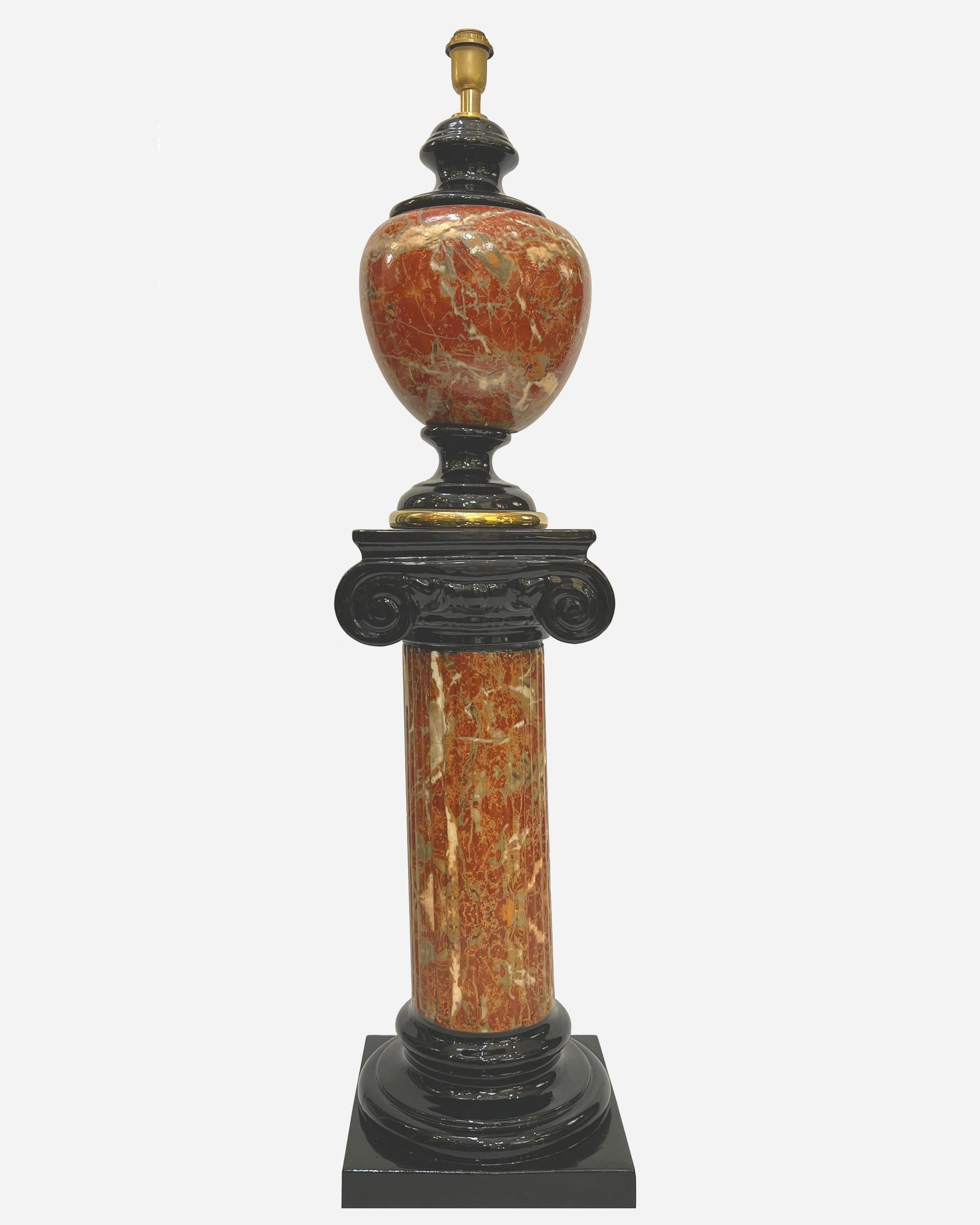 Pair of ceramic lamps and columns, with trompe-l’oeil enameled decoration of gray and white veined red marble and black lacquer. The bases of the lamps are enhanced by a gilded fillet.
Lamp height: 58 cm (22.8 inches)
Lamp diameter: 30 cm (11.8