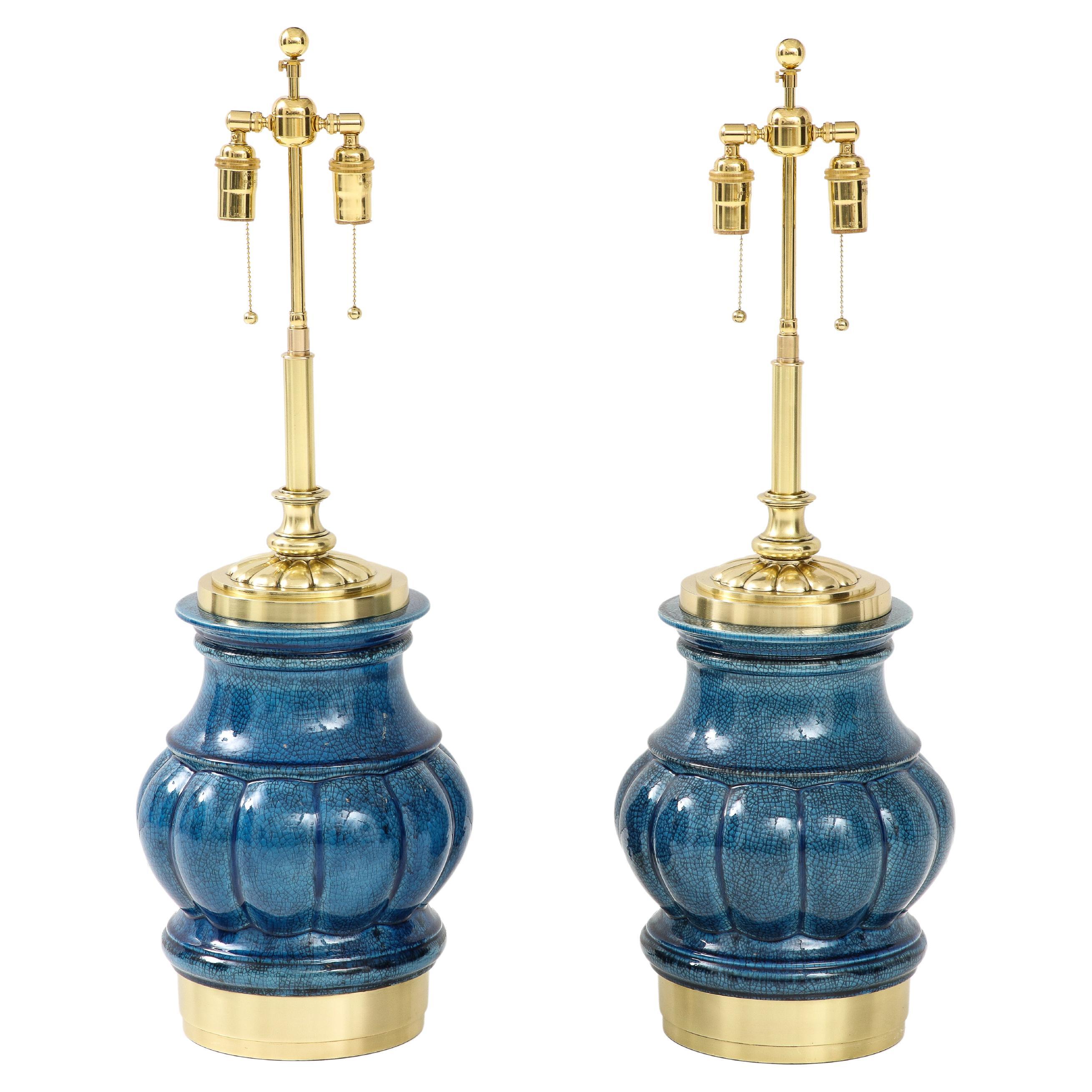 Paire de  Lampes en céramique à glaçure bleue craquelée. en vente