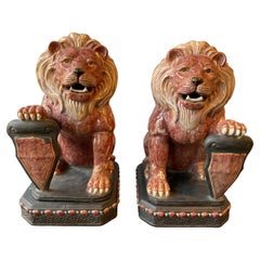 Pair Of Ceramic Lions With Shields Pair Of Ceramic Lions With Shields