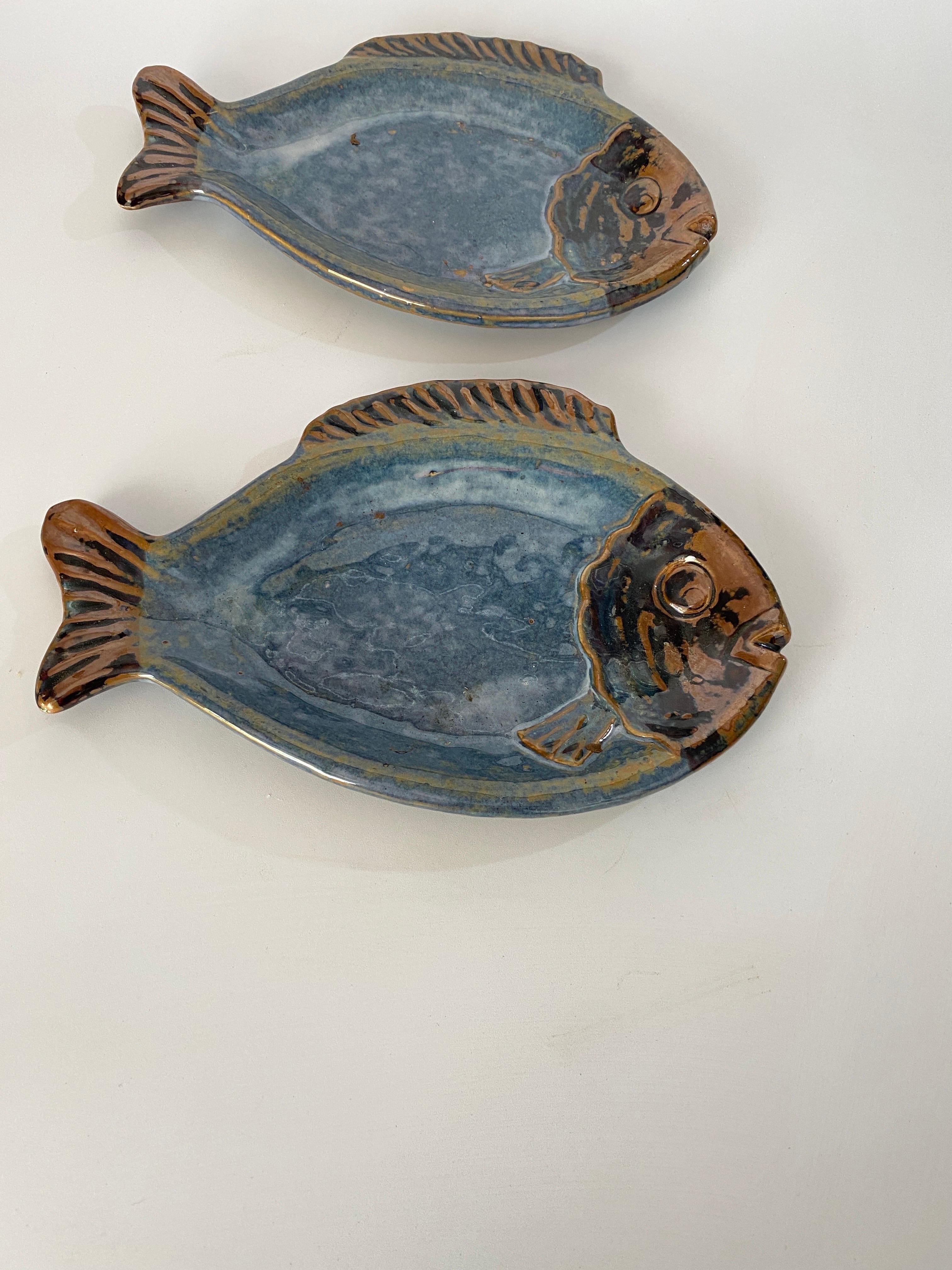 Pair of small Ceramic dishes. Blue in color verging on grey. They can be used as a dish or as a vide poche. They were made in France in the 1960s, they are in good condition.
