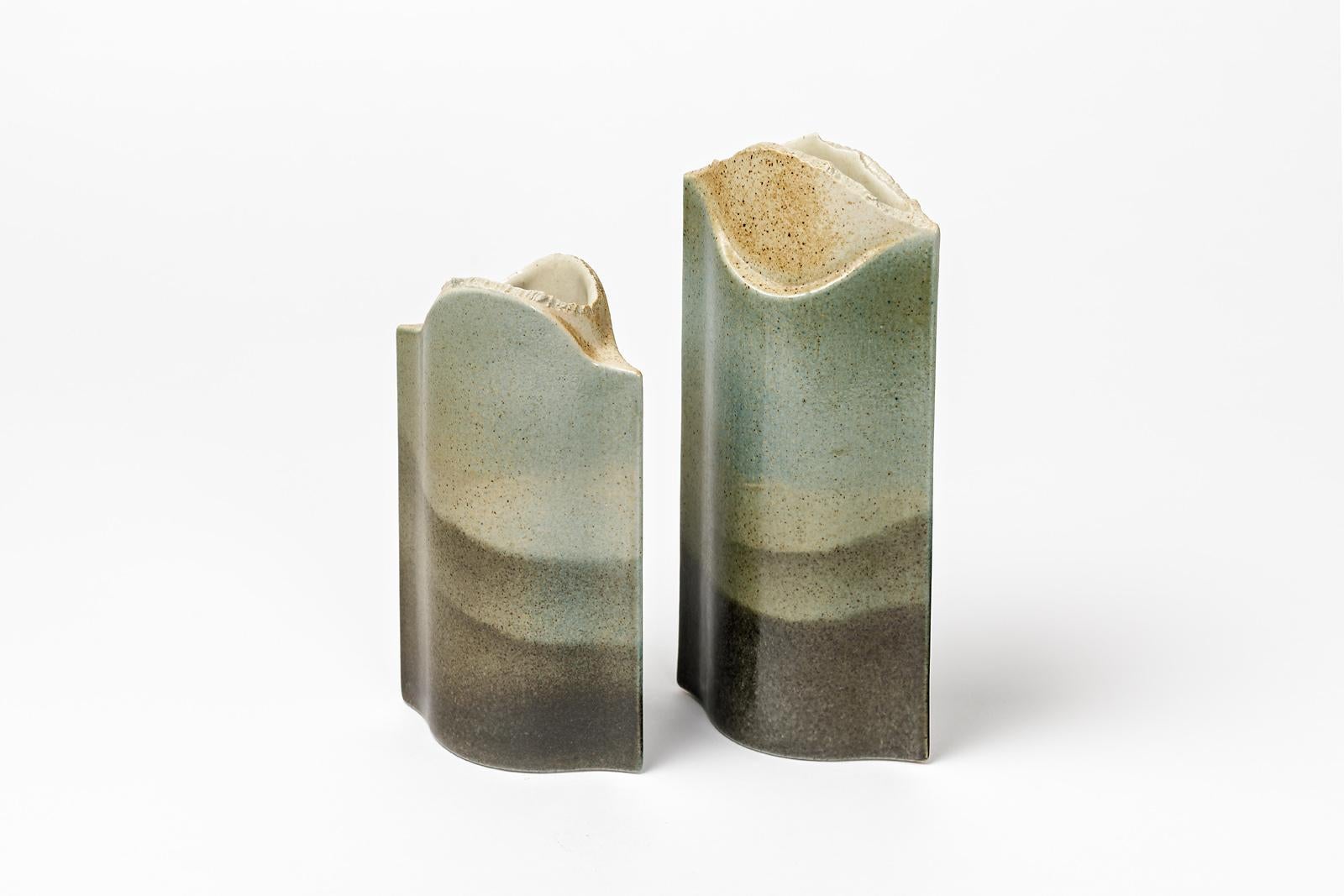B. Prigent

Pair of ceramic porcelain vase signed by the French artist.
Ceramic glaze color with landscape decoration.

Original perfect conditions 

Signed under the base.

Dimensions: 12 x 11 x 6cm and 23 x 11 x 6cm.