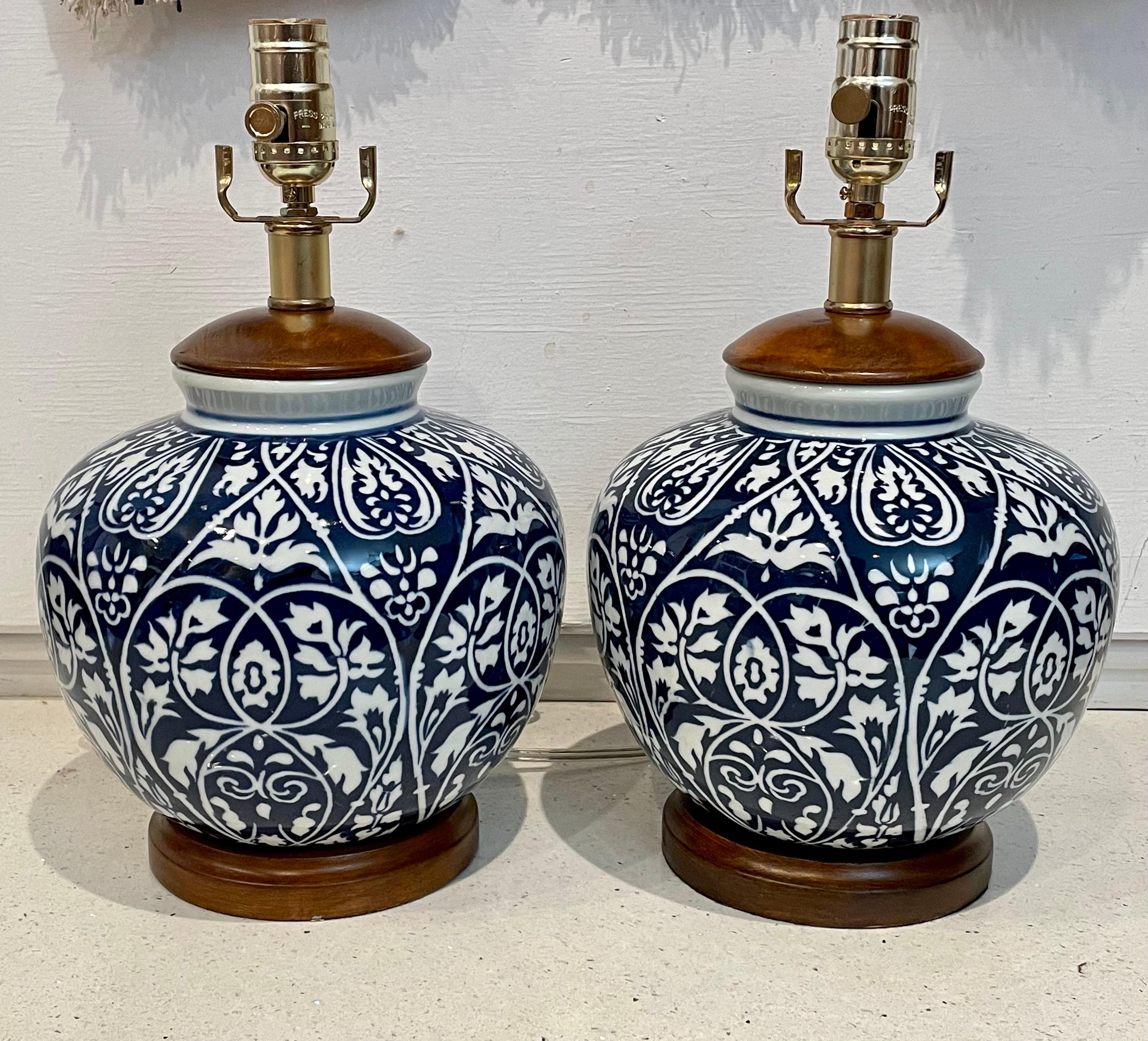 Beautiful pair of ceramic porcelain finish table lamps by Ralph Lauren, freshly rewired great condition like new, lampshades are not included, each lamp is 14