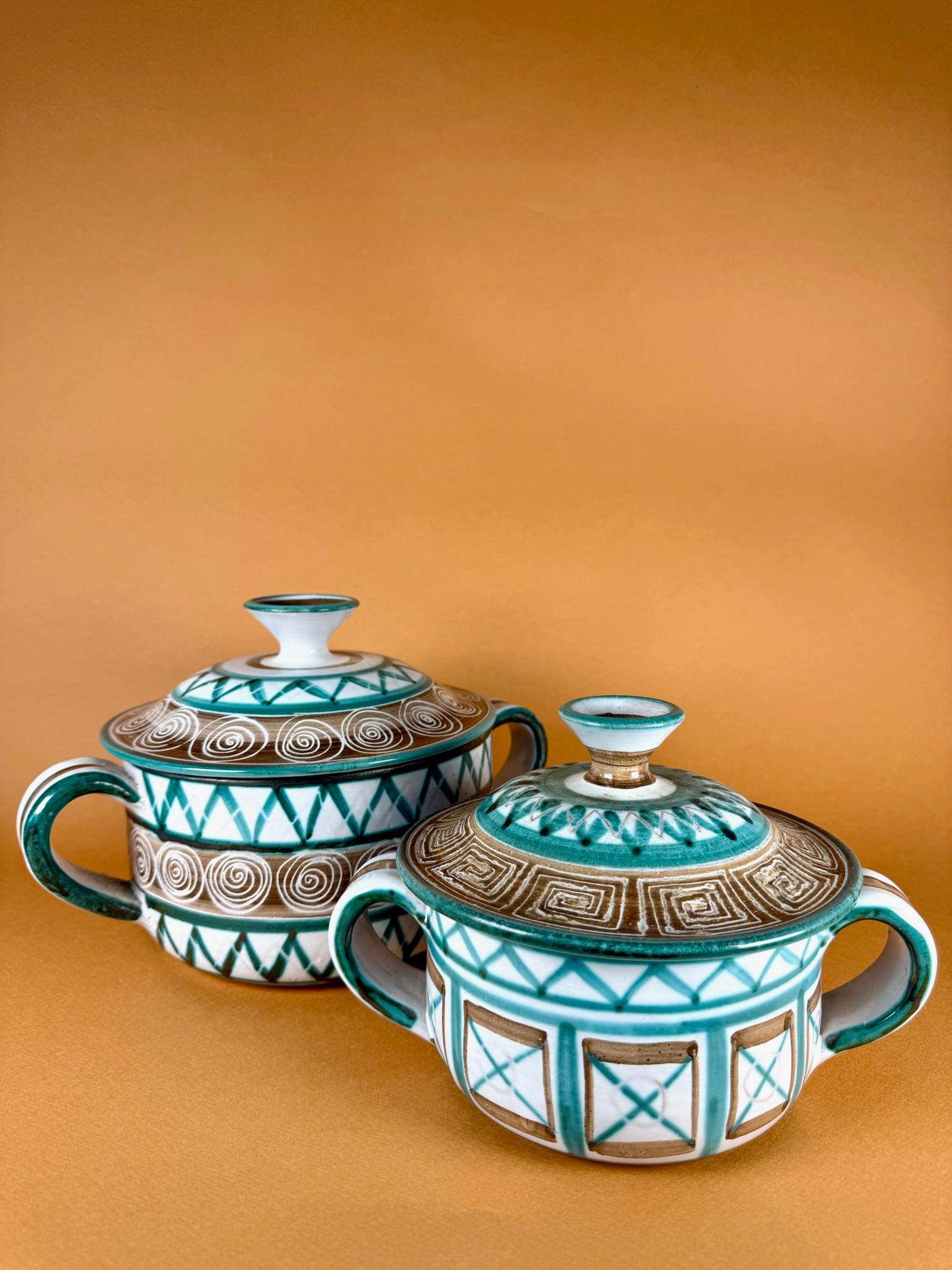 Origin
Vallauris, France, circa 1950s

Materials
Glazed ceramic

Condition
Very good vintage condition, consistent with age and use

A pair of lidded ceramic pots by Robert Picault, one of the most celebrated ceramists of Vallauris during the