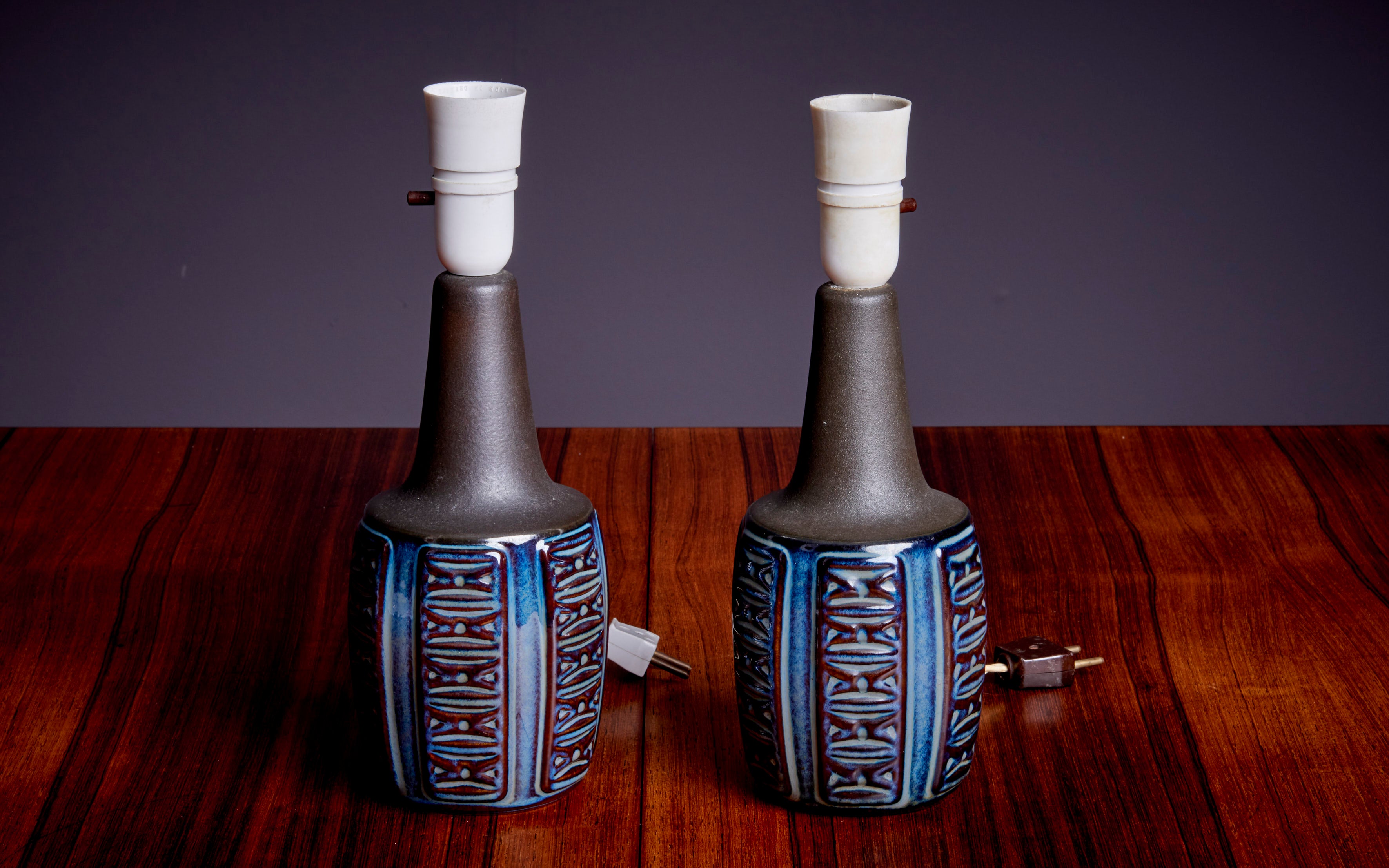 Pair of Ceramic table lamps by Soholm, Denmark - 1960s. The lamps are being sold without shade. The measurements given apply to the lampstand. 

Søholm Stentøj, also known as Søholm Stoneware, is a Danish ceramics company that was founded in 1835