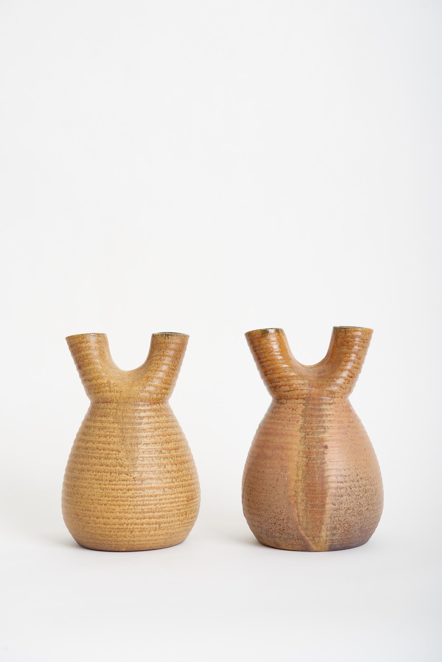 A pair of double-neck ceramic vases by Accolay.
France, 1950s.