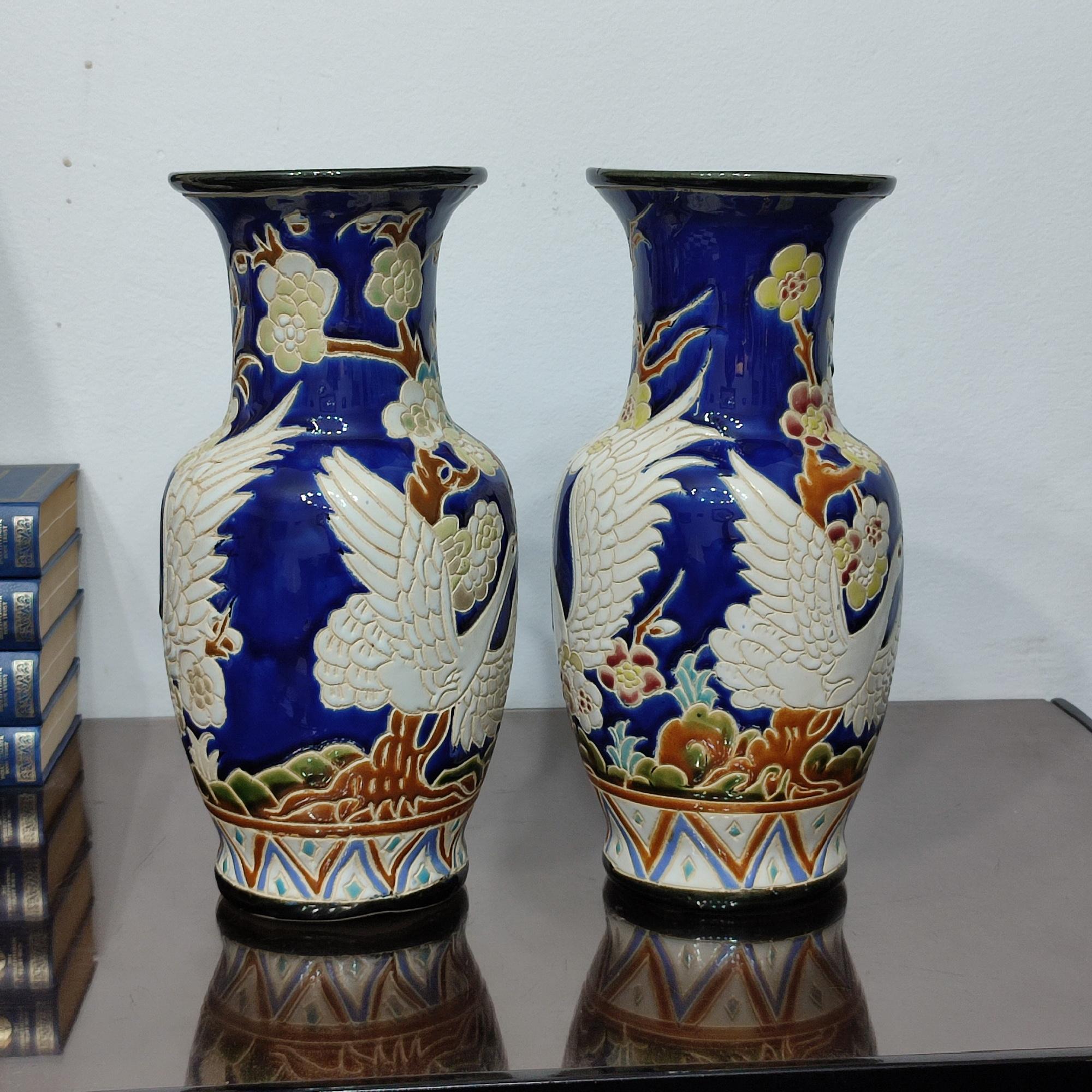 European Pair of Ceramic Vases with Wonderful Flying Swans and Cherry Flowers Decor