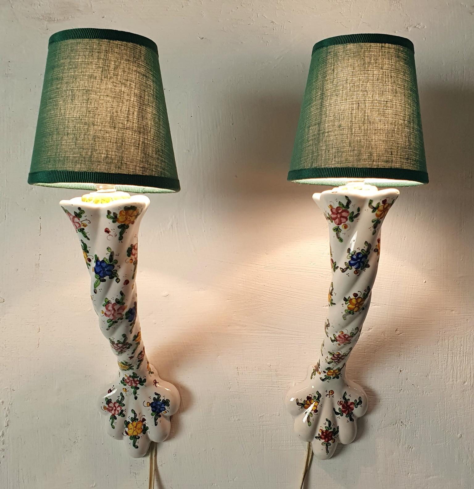 Beautiful pair of ceramic wall sconces made by Biagioli-Gubbio ceramics. Vasellari mastro CM. They are painted with floral motifs and made with scrolls and flowers and made to recall the Venetian style of 18th century flowers in a provincial rococo