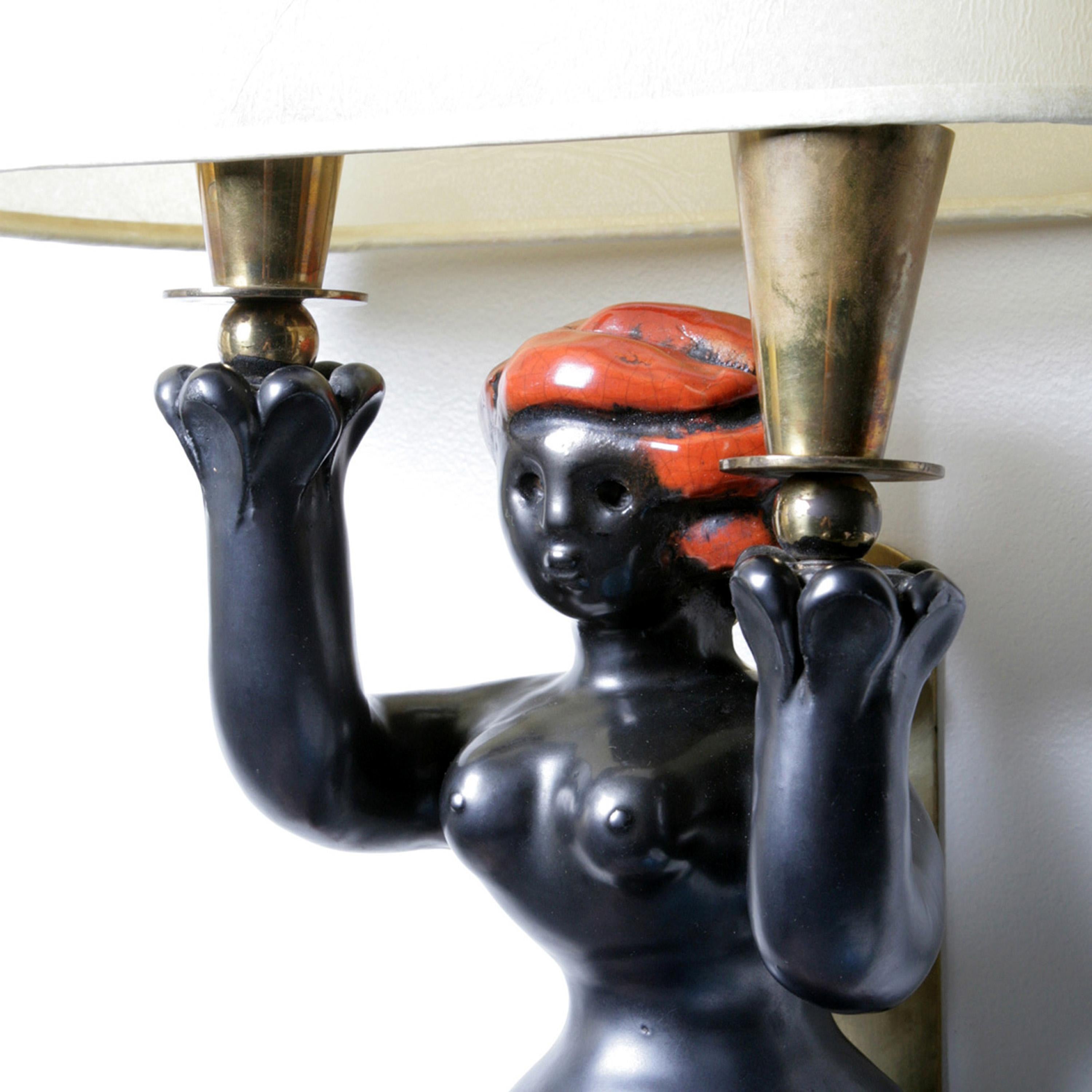 Mid-Century Modern Pair of ceramic wallights, Model Sirenes, by Georges Jouve.(1910-1964) For Sale