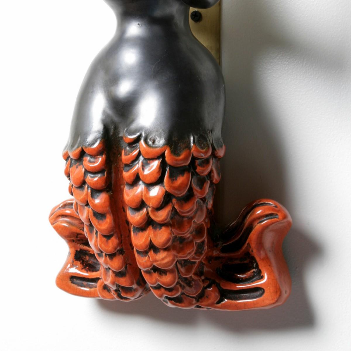 French Pair of ceramic wallights, Model Sirenes, by Georges Jouve.(1910-1964) For Sale