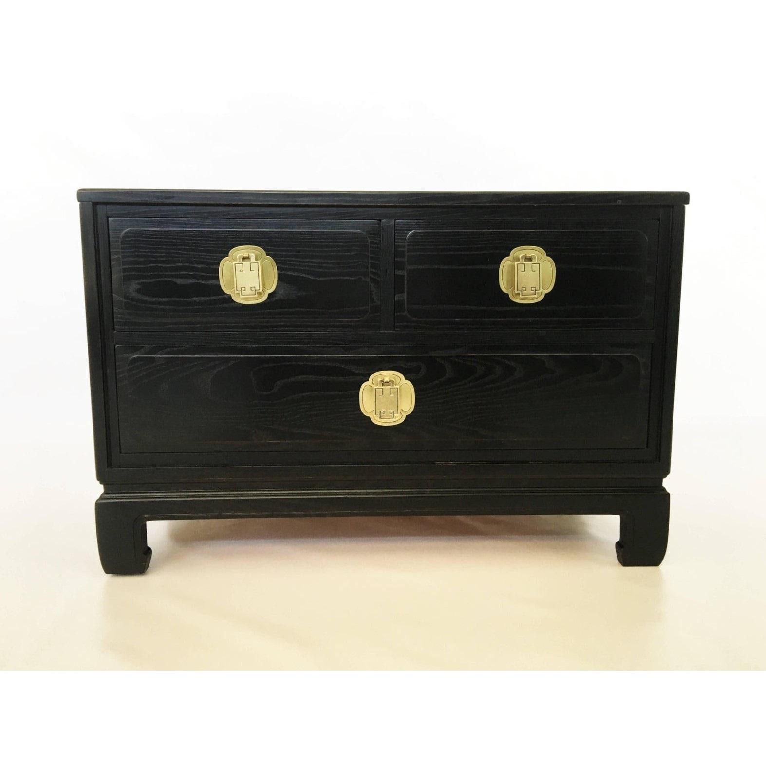 Pair of nightstands featured in cerused oak by Davis Cabinet Company. These Asian style bedside tables have a raised base, dovetailed joinery and carved trim. The cerused oak has acquired a wonderful aged patina and still looks great. These are well