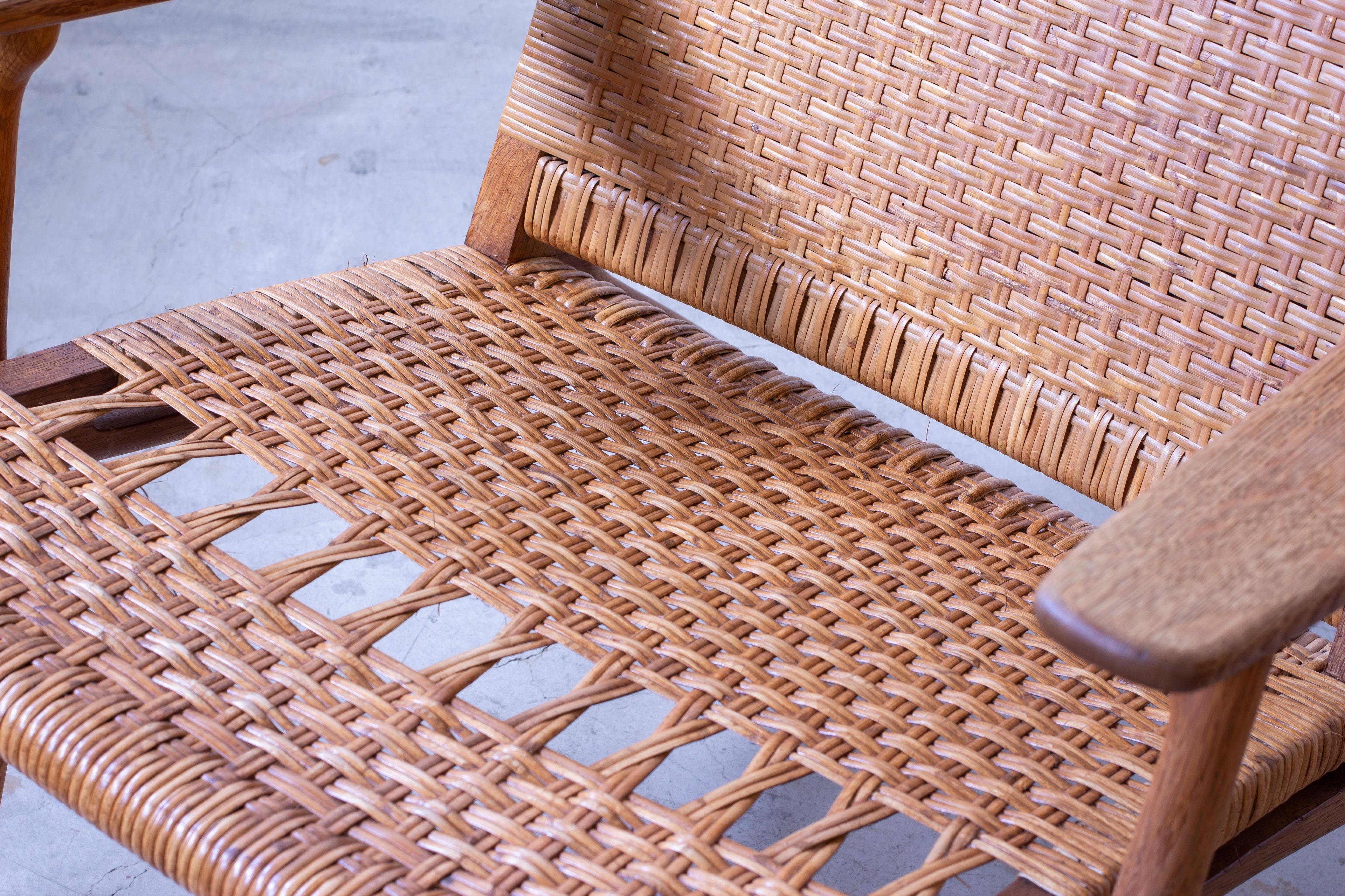 Pair of CH-27 oak and cane weave lounge chairs by Hans J. Wegner, Carl Hansen For Sale 1