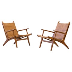 Paire de chaises longues CH-27 en chêne et cannage de Hans J. Wegner, Carl Hansen