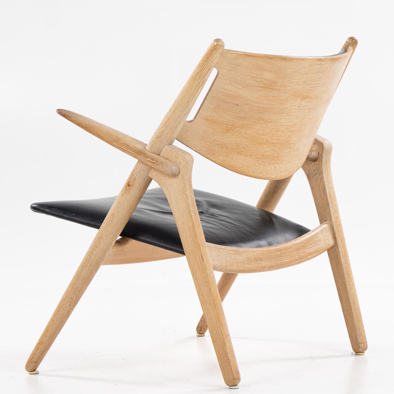 Scandinave moderne Paire de fauteuils CH 28 Sawbuck de Hans J. Wegner. en vente