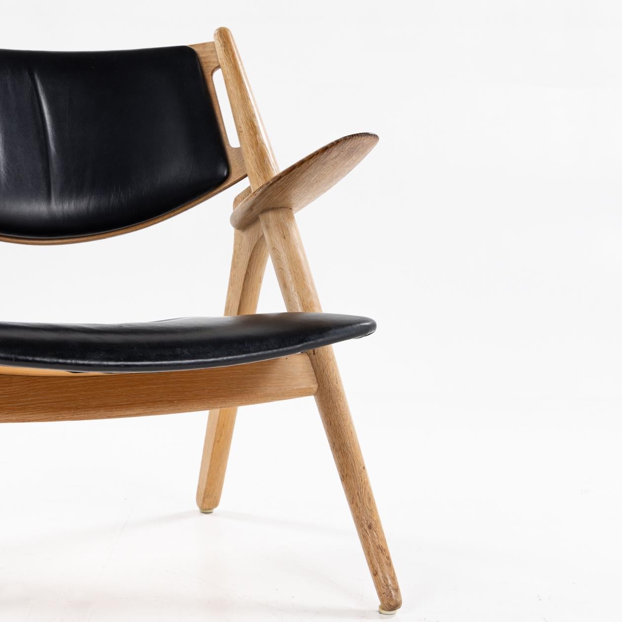 Paire de fauteuils CH 28 Sawbuck de Hans J. Wegner. Bon état - En vente à Copenhagen, DK