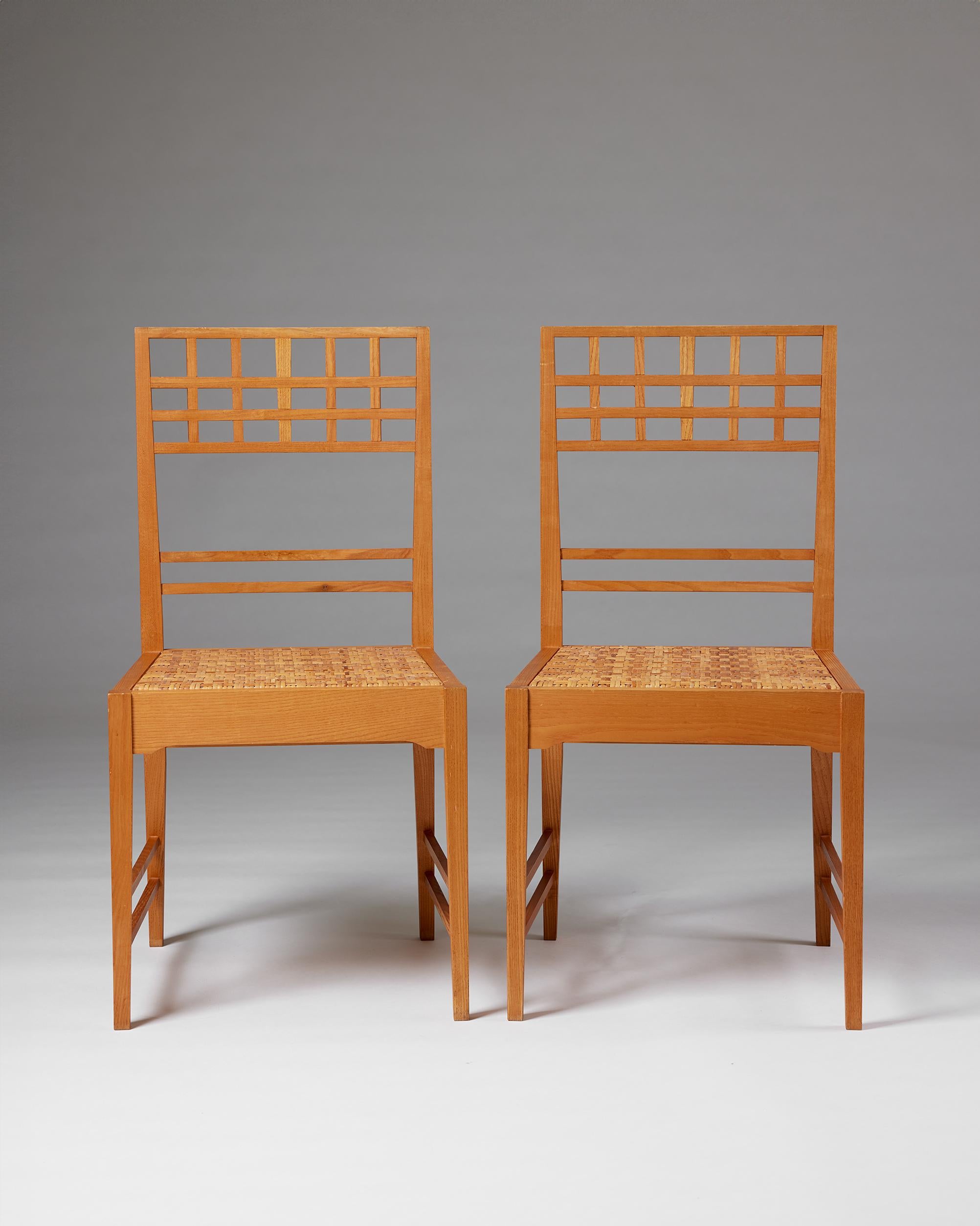 Swedish Pair of chairs attributed to Erik Chambert, Sweden, 1950s, mother of pearl inlay For Sale