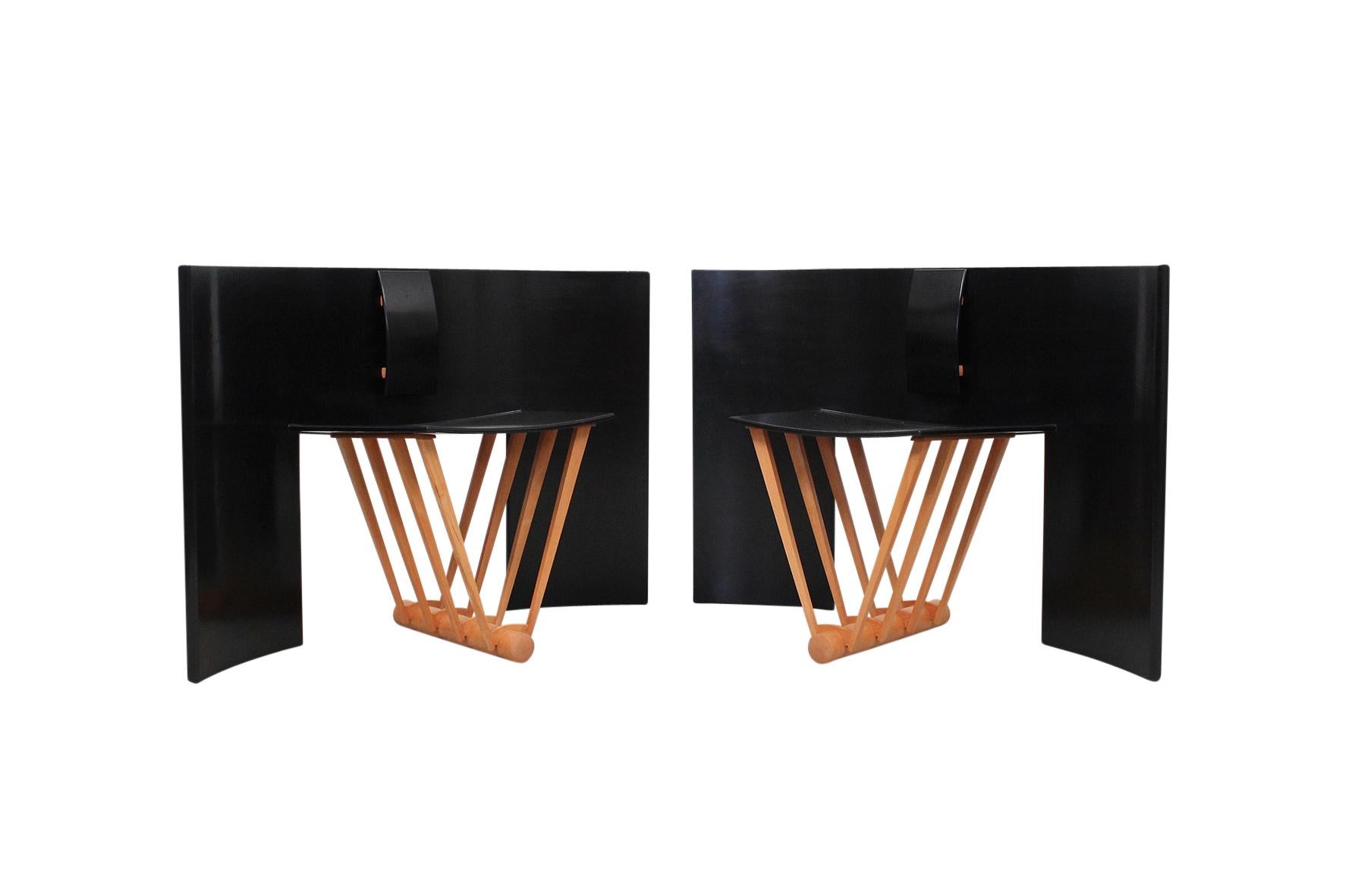 Pair of architectural chairs by widely exhibited studio furniture maker Thomas Hucker. These 