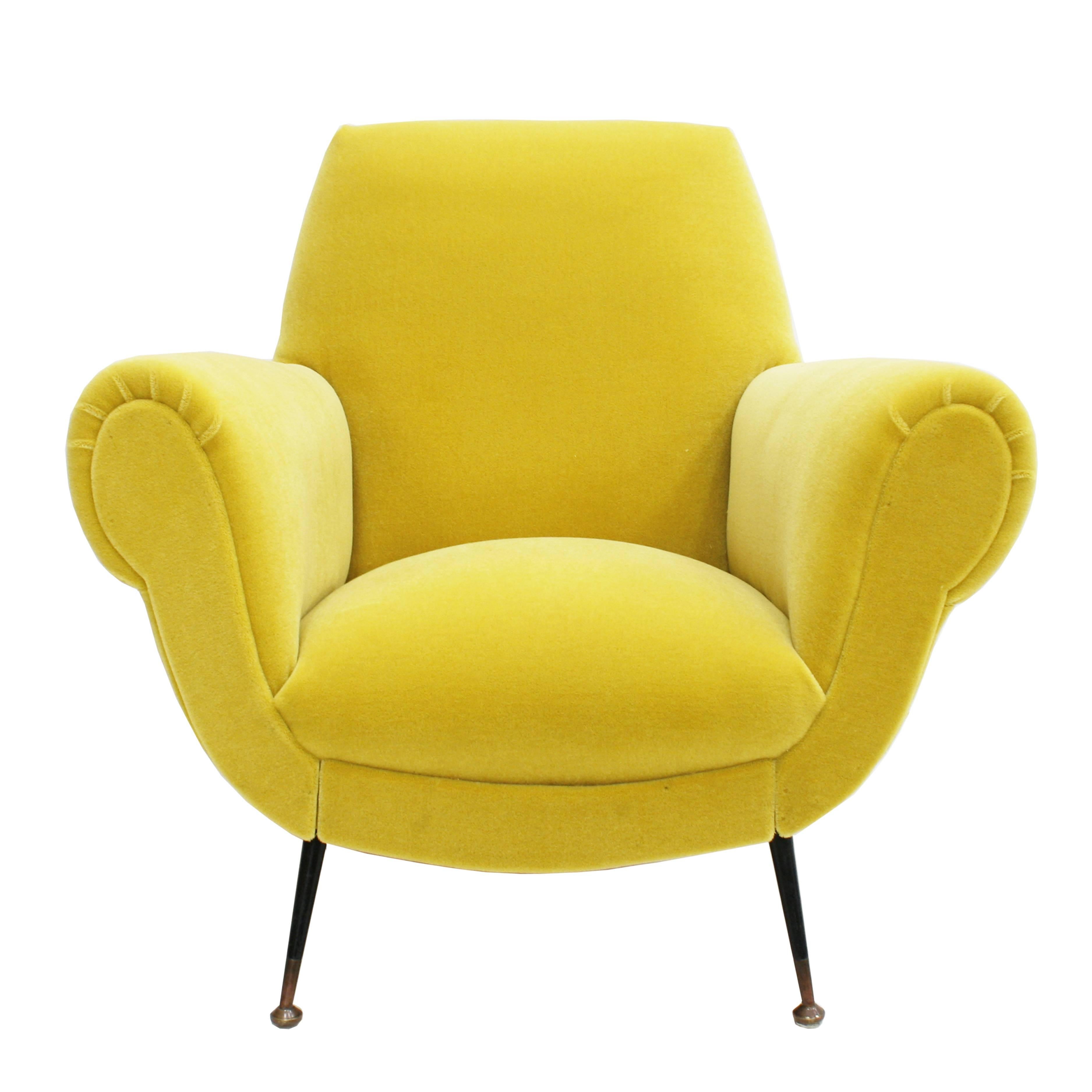 Pair of chairs with solid wood structure with brass legs. Designed by Gigi Radice for Minotti. Upholstered in yellow cotton velvet designed by India Mahdavi for Pierre Frey.