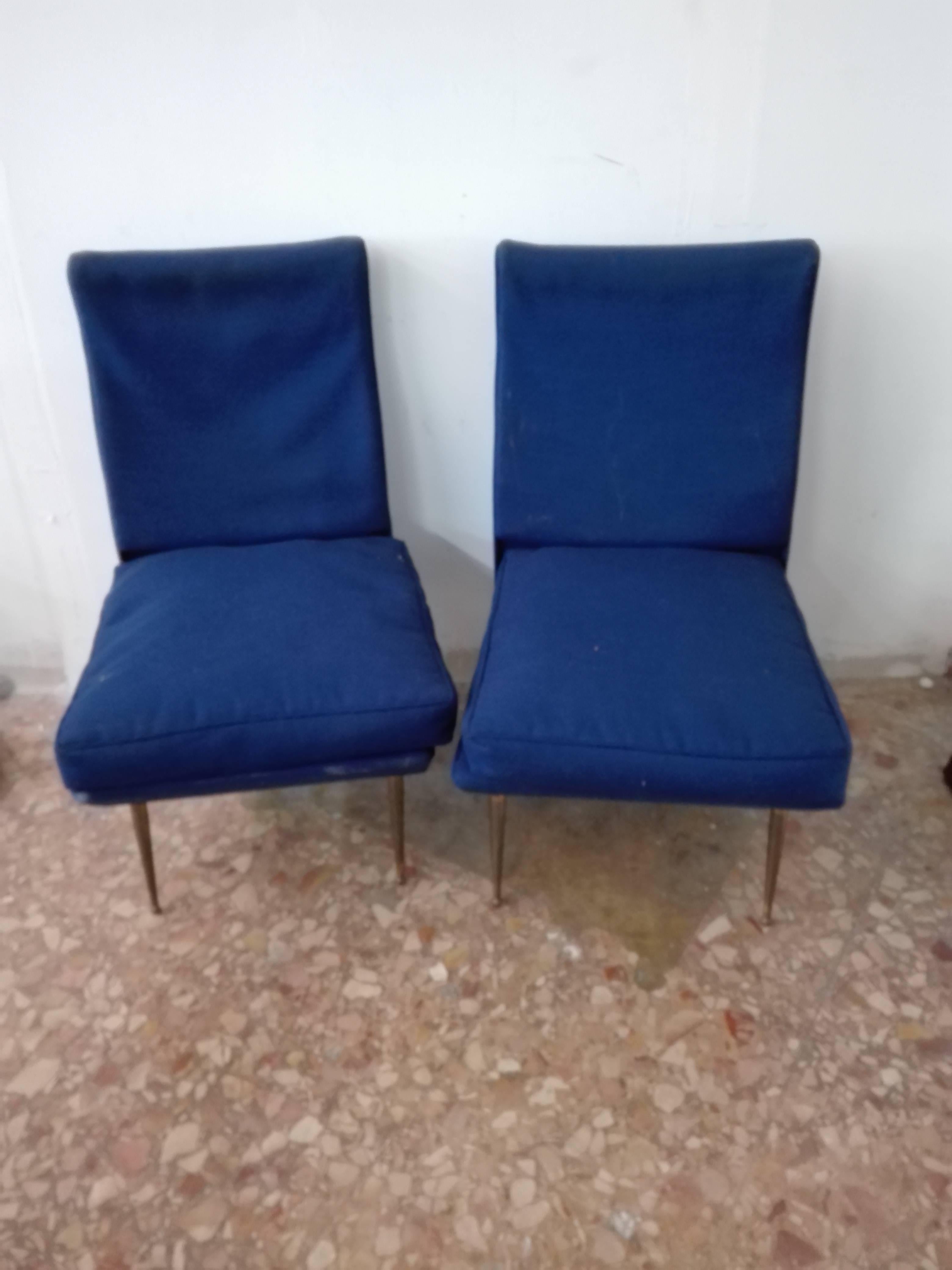 A pair of chairs, fabric upholstery, metal legs. Produced in Italy, in the 1950s.