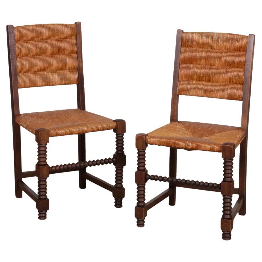 Pair of chairs in the taste of Charles Dudouyt, 1950