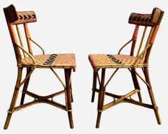 Pair of chairs in woven rattan France, circa 1920