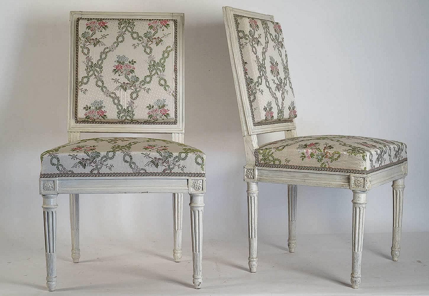 An elegant set of a pair of chairs in hand-carved and lacquered fruitwood in a classic Louis XVI style. Georges Jacob stamps our couple of chairs.

Our set is in excellent condition and there upholstered with a new beautiful floral silk