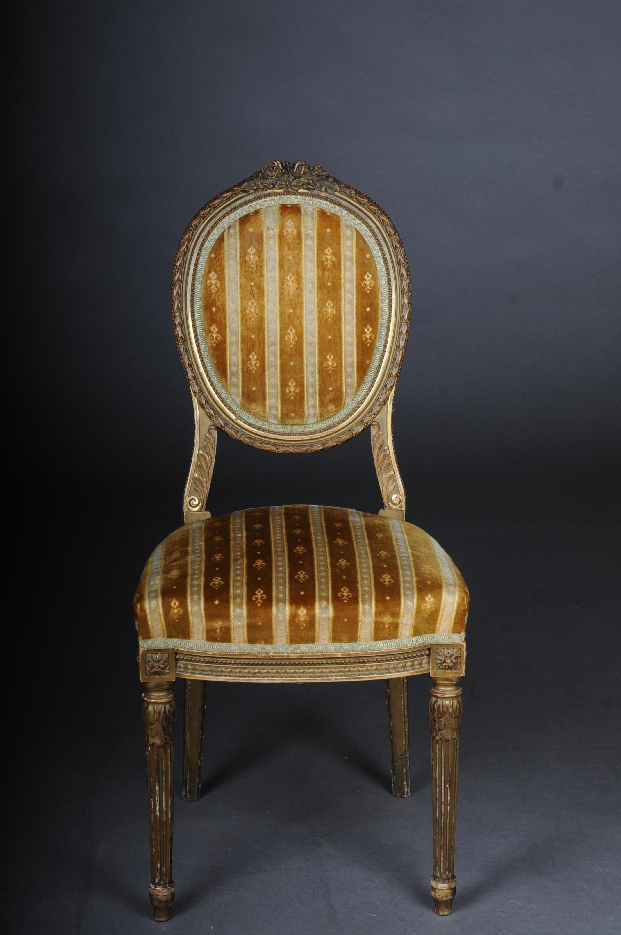 Pair of chairs St. Petersburg, Russia circa 1910 Jakob & Iosif Kone

High-quality Russian salon chairs from the furniture workshop Jokob & Iosif Kone, St. Petersburg, around 1910-1925.
Solid wood carved and gilded and partly gold-plated. Pointed