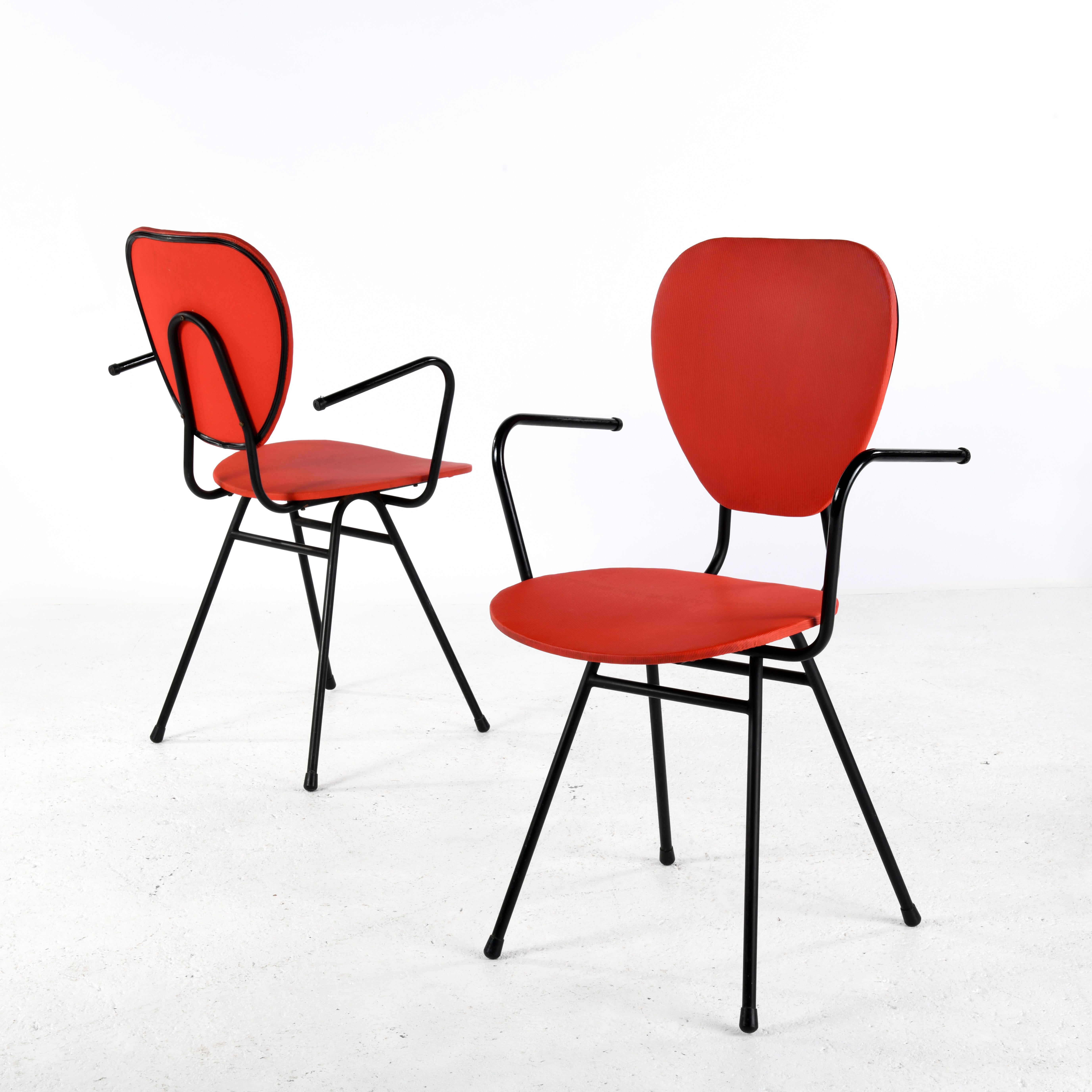 Steel Pair of chairs with armrests by Jacques Hitier, published in France in the 1950 For Sale