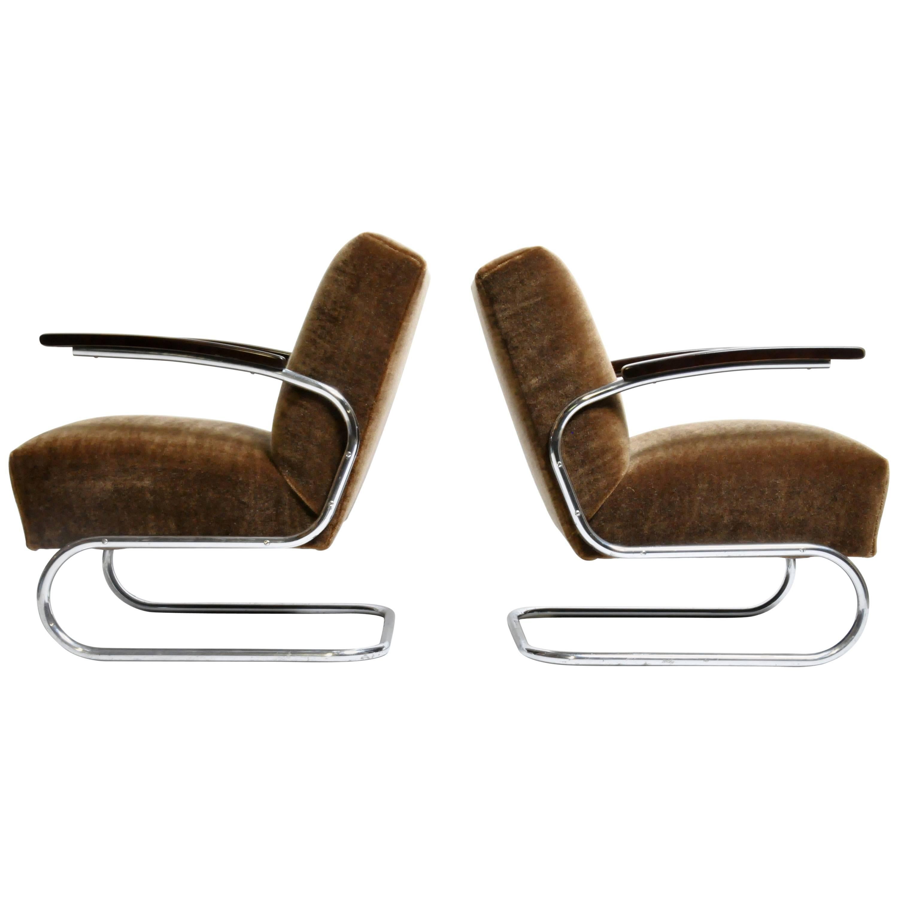 Pair of Chairs with Curved Chrome Legs