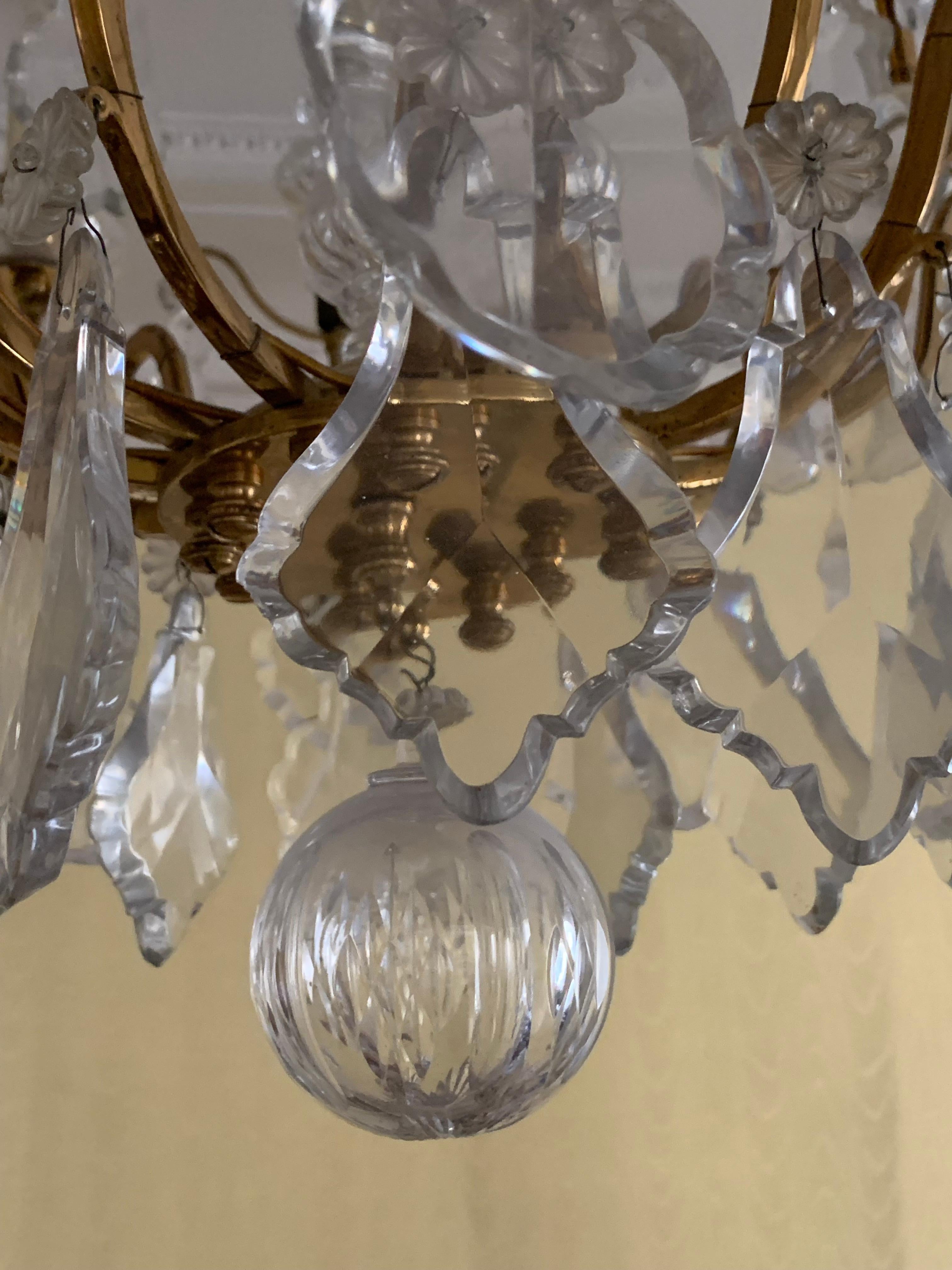 Pair of chandelier in crystal and bronze 12 lights, six all around, 3  inside on the top ,3 inside bottom, look the video its much better
this pair of chandelier are very elegant and can go in all interior,modern ,classic 
probably by baccarat due